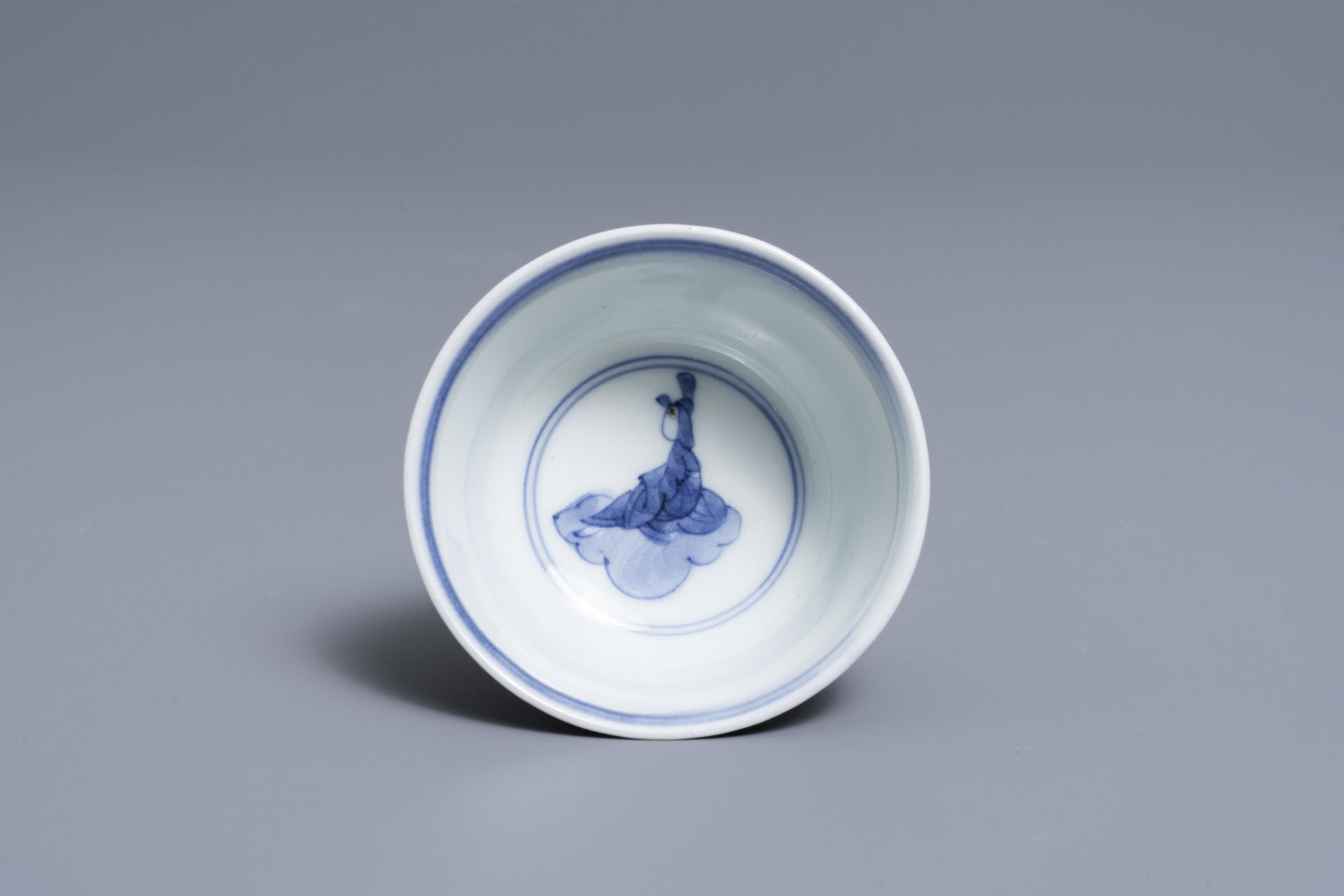 Two Japanese blue and white Arita plates and a cup and saucer, Edo, 17/18th C. - Image 11 of 11