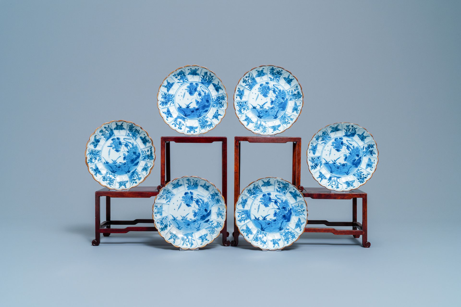 Six Chinese blue and white lobed plates with ducks and butterflies, Kangxi