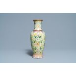 A Chinese famille rose lime green-ground vase, Qianlong mark, Republic