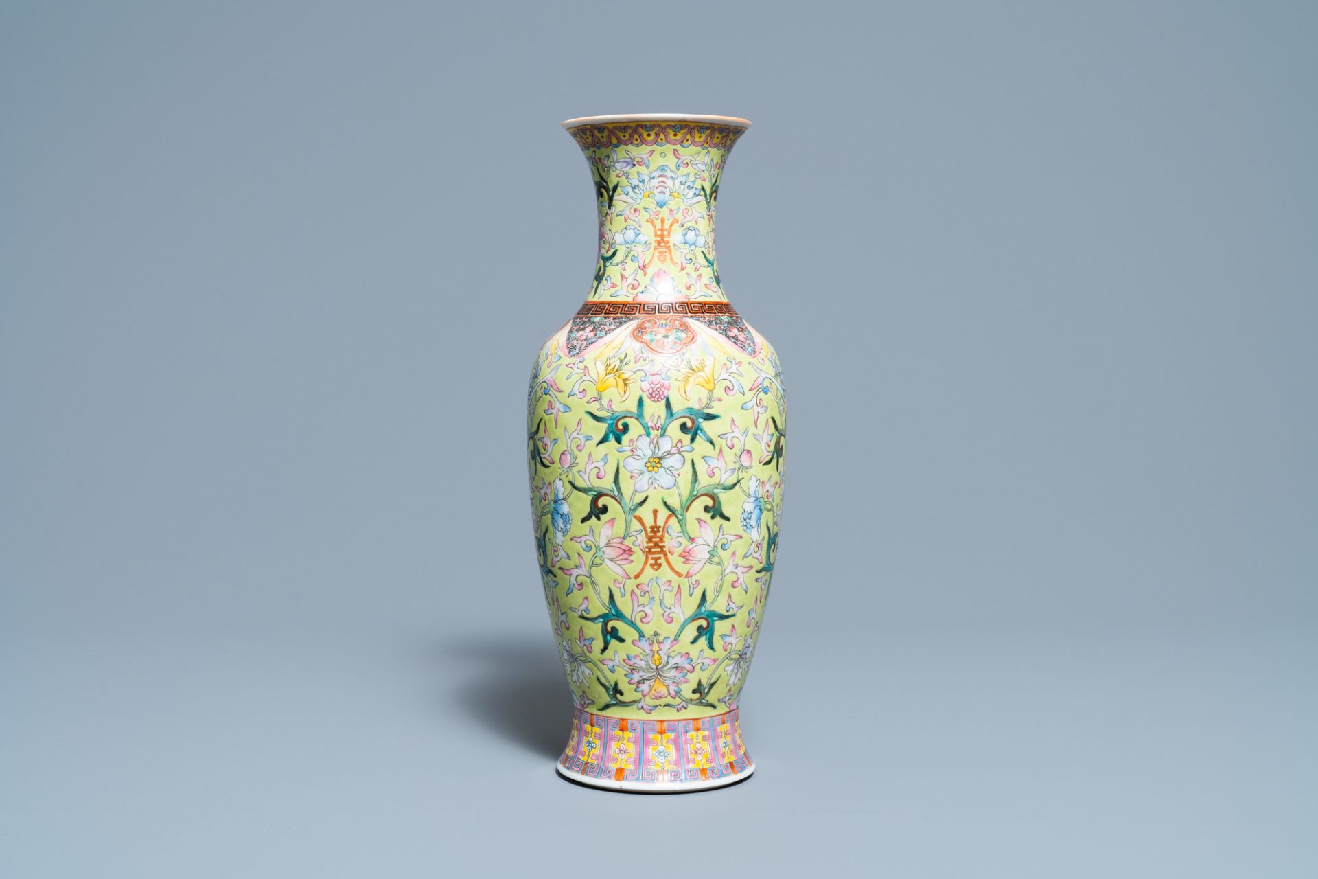 A Chinese famille rose lime green-ground vase, Qianlong mark, Republic