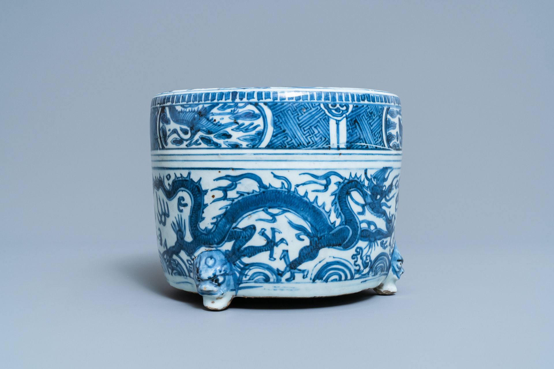 A Chinese blue and white 'dragon' tripod censer, Ming - Image 3 of 20