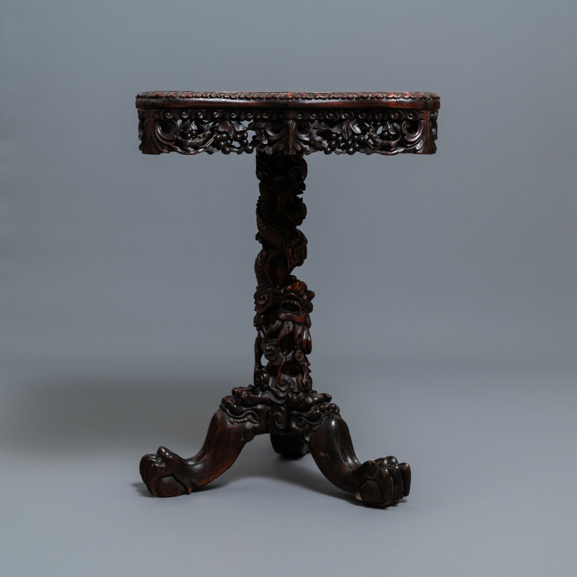 A Chinese carved wooden side table with marble chessboard top, 19th C. - Image 7 of 17