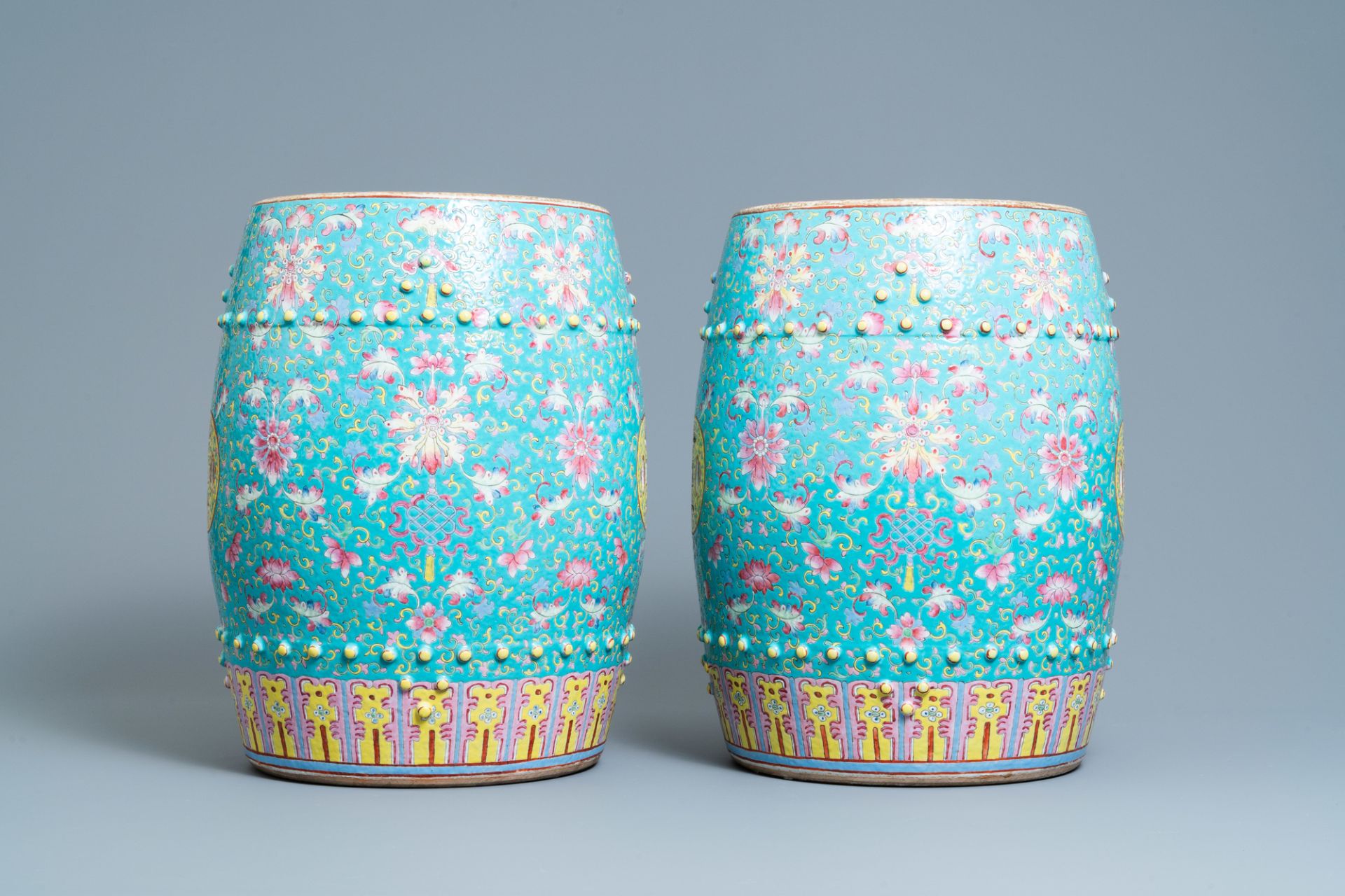 A pair of Chinese turquoise-ground famille rose garden seats, 19th C. - Image 5 of 7