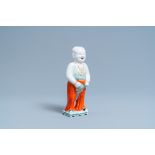 A Chinese famille verte water dropper modelled as a peeing boy, Qianlong