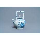 A large Chinese blue and white 'birds' wine ewer and cover, Transitional period