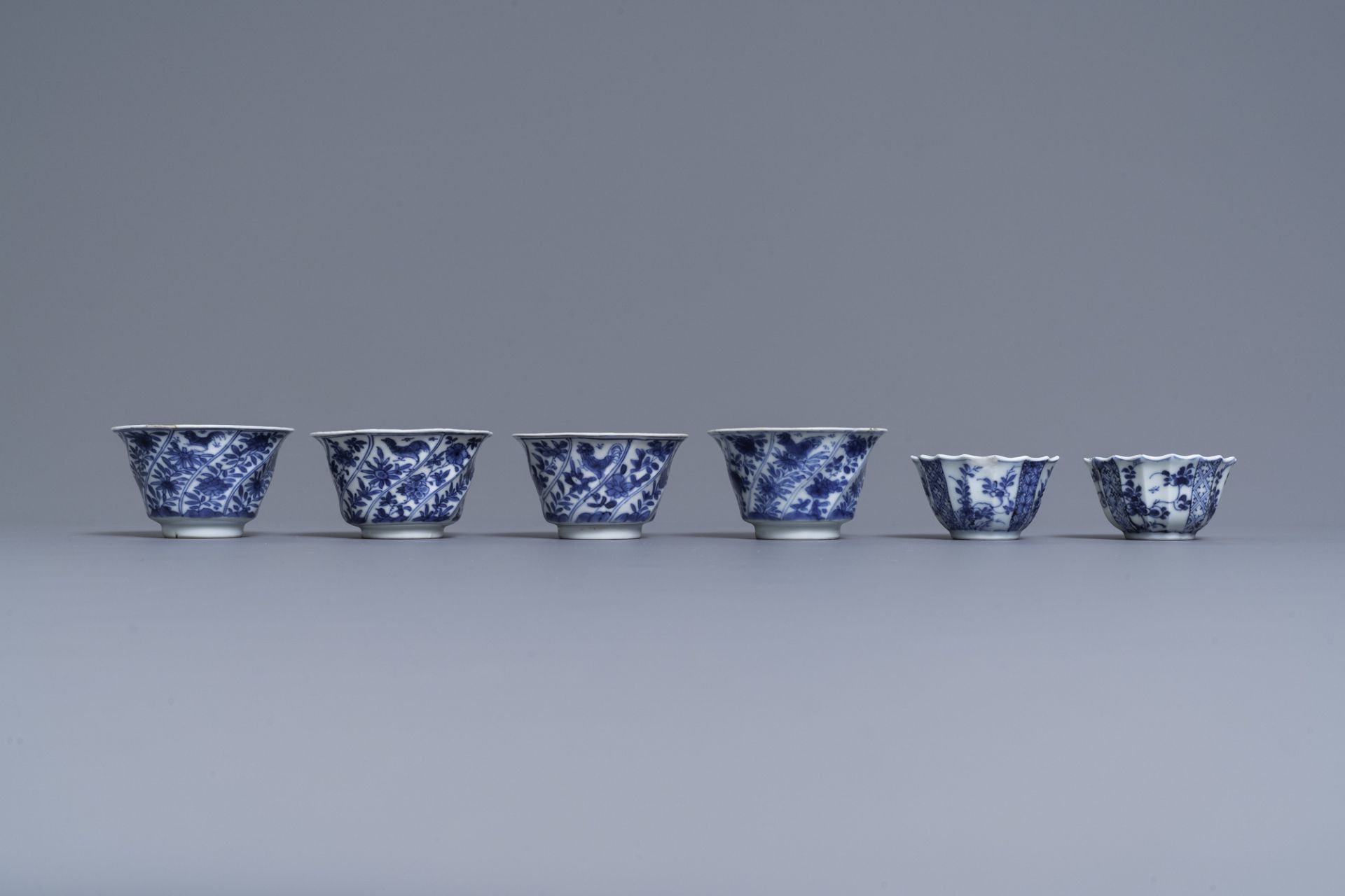 Six Chinese blue and white cups and saucers and eleven miniature vases, Kangxi - Image 14 of 17