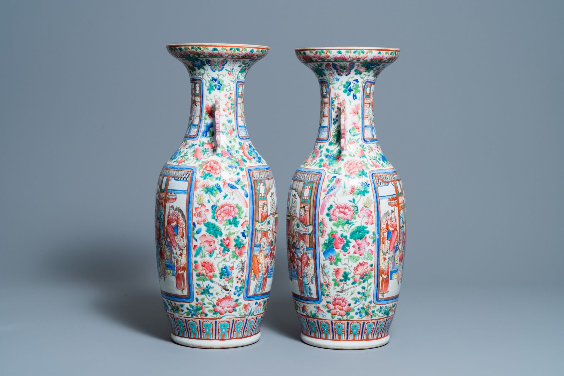A pair of Chinese famille rose 'court scene' vases, 19th C. - Image 4 of 6