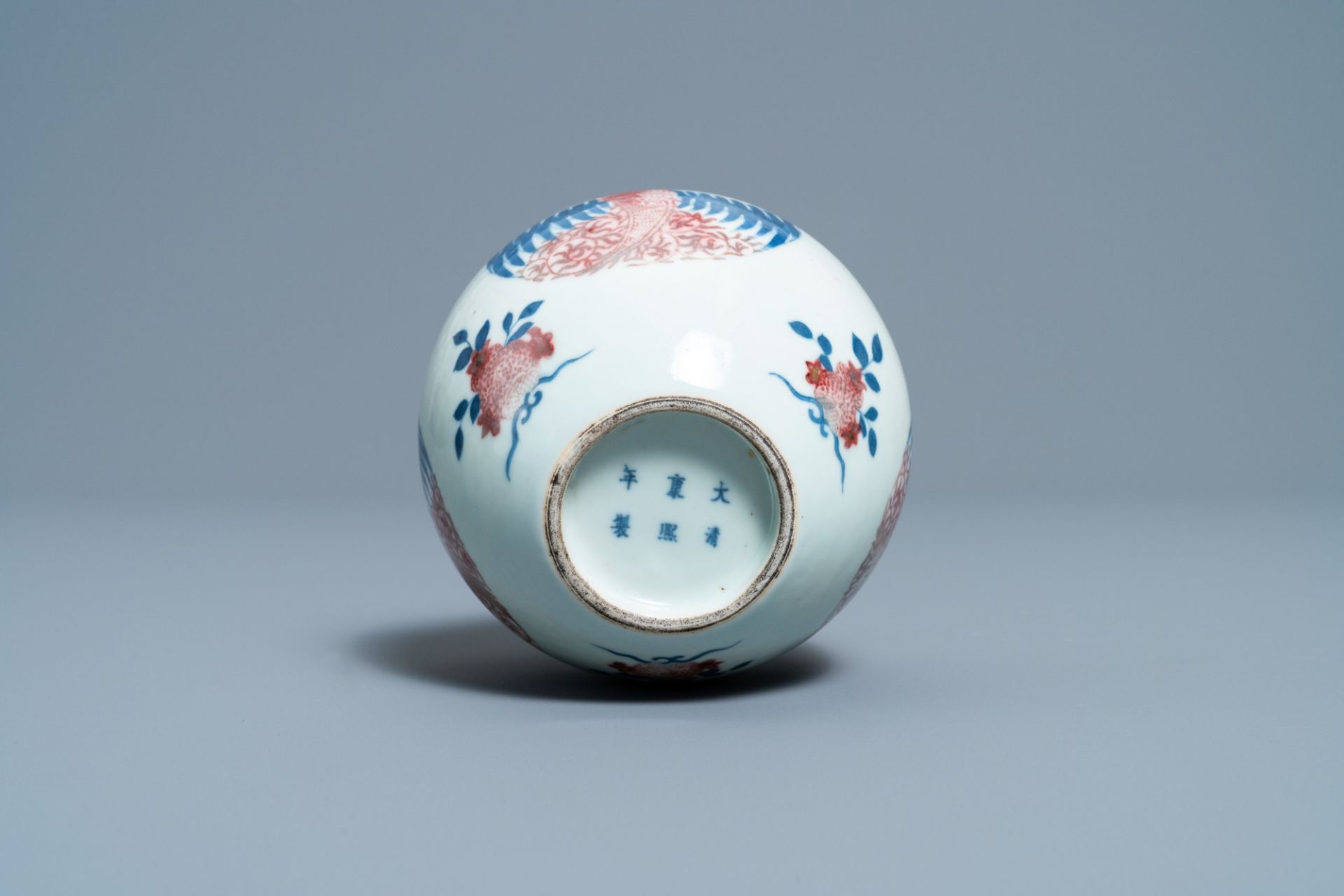 A Chinese blue, white and copper-red 'phoenixes' water pot, Kangxi mark, 19th C. - Image 7 of 7