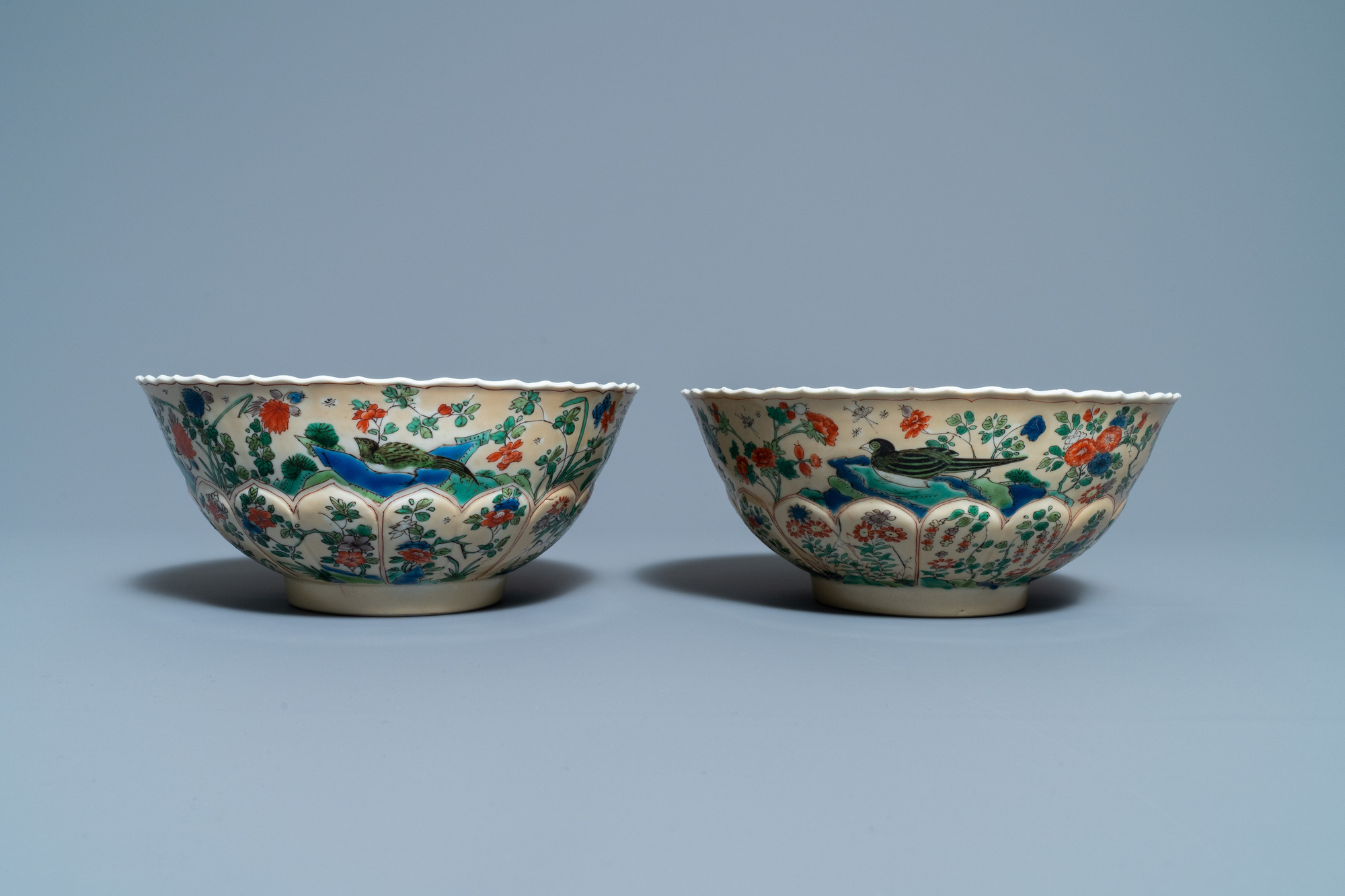 A pair of Chinese famille verte cafe-au-lait-ground lotus-molded bowls, Kangxi - Image 3 of 8