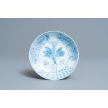 A Chinese blue and white 'pomegranate tree' plate, Yongzheng mark and of the period