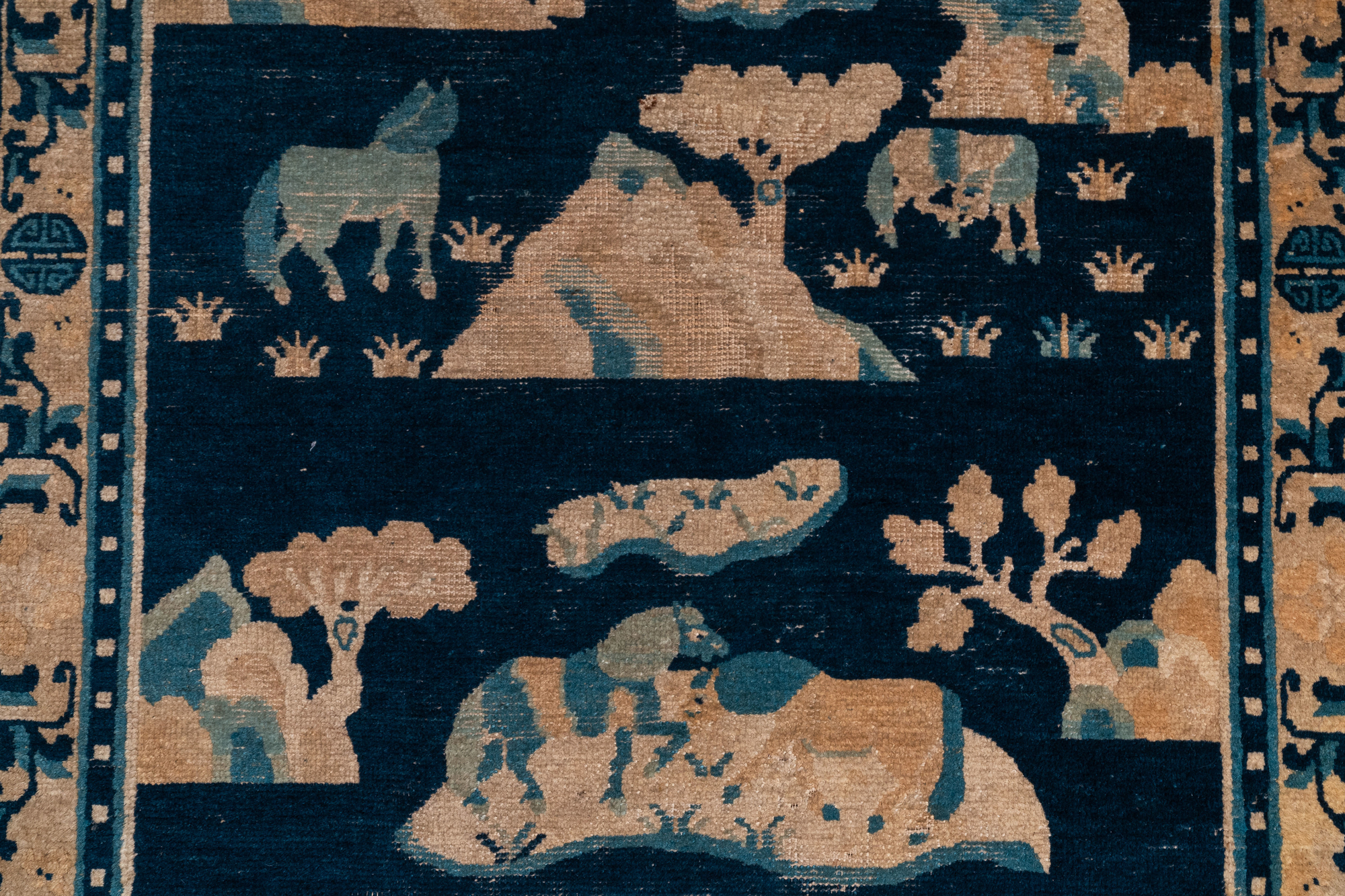 A large Chinese rectangular 'Eight horses of Mu Wang' carpet, 19th C. - Image 4 of 5