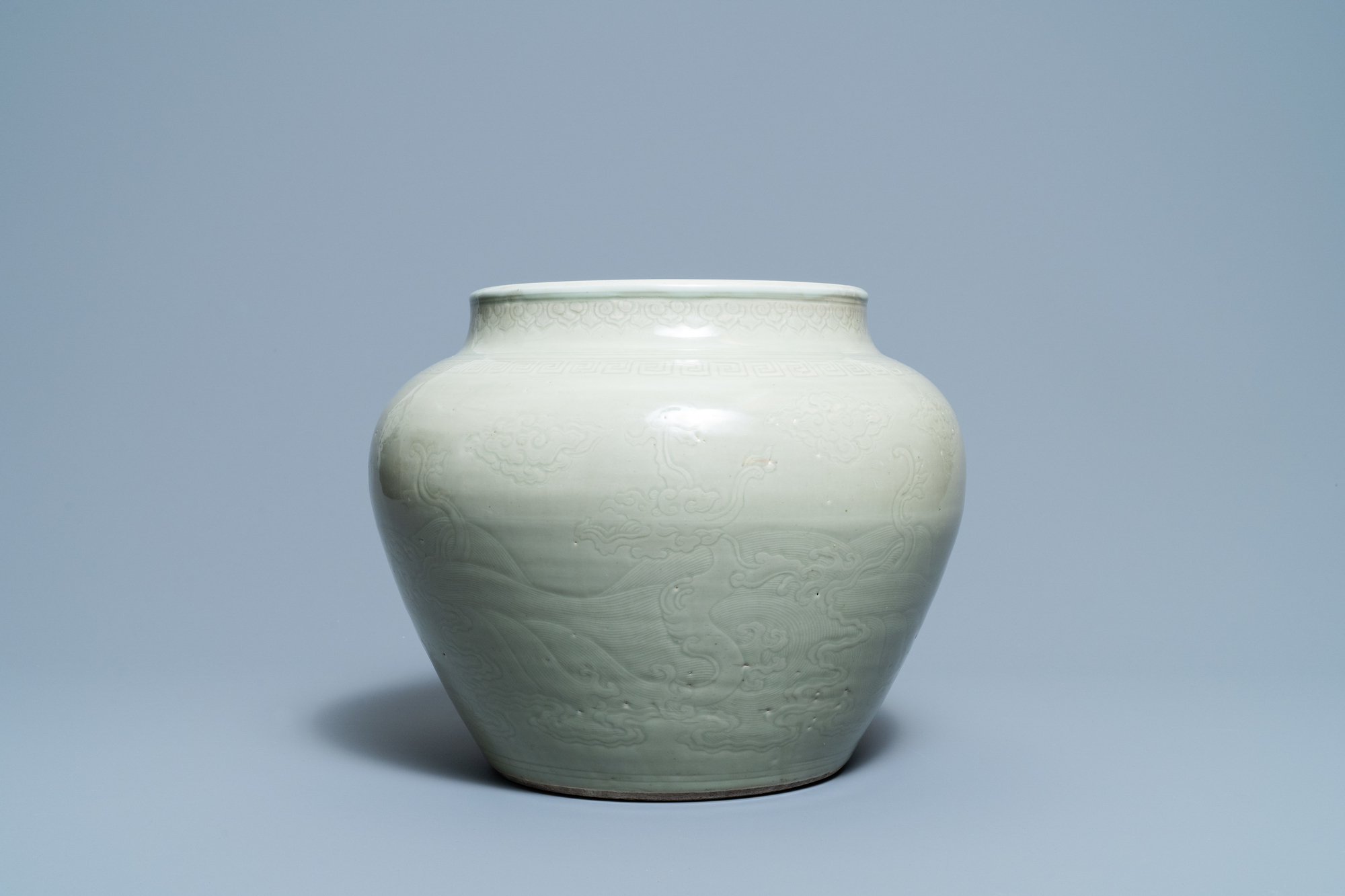 A globular Chinese monochrome celadon 'dragon' vase, Kangxi - Image 6 of 8