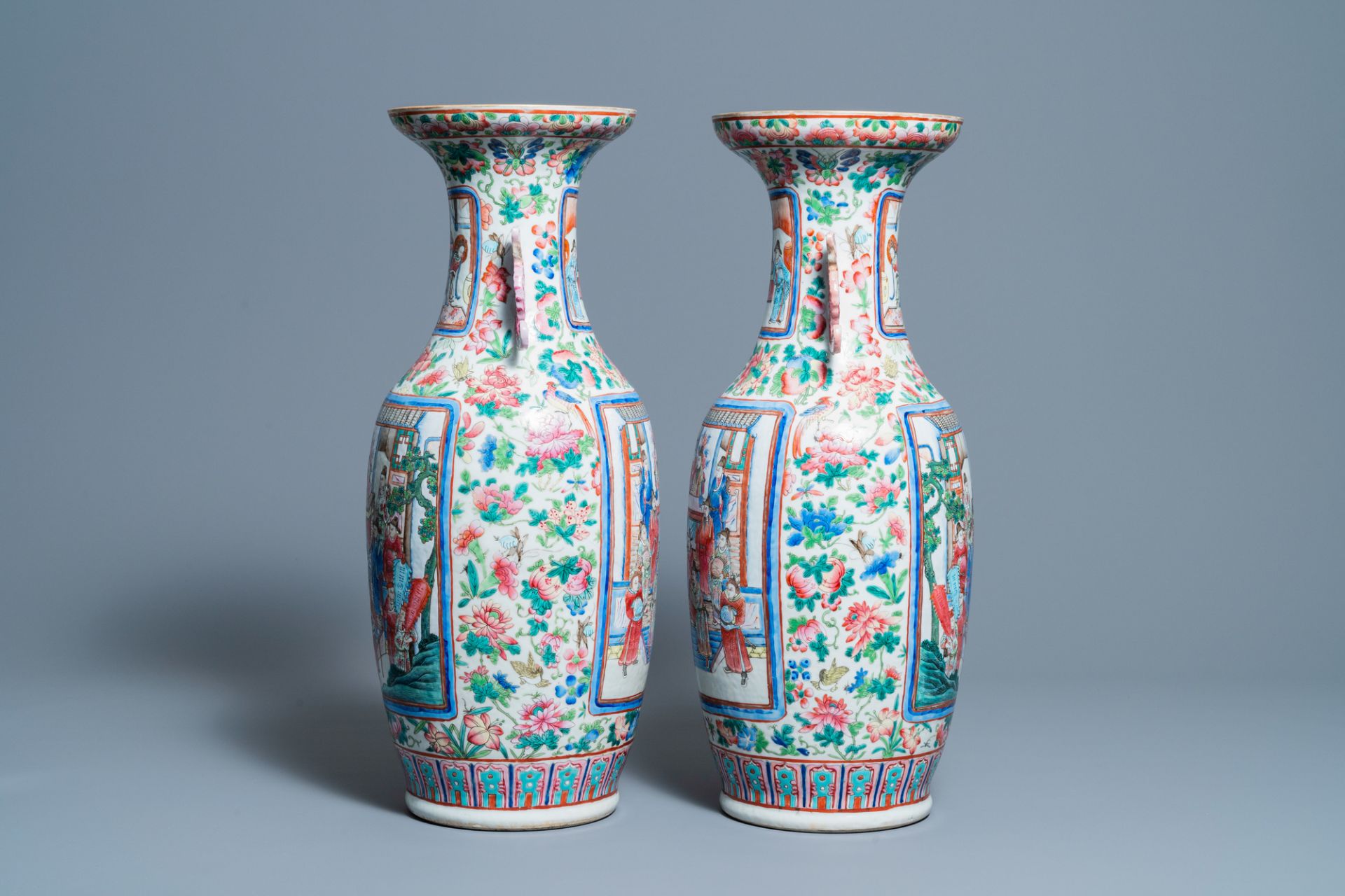 A pair of Chinese famille rose 'court scene' vases, 19th C. - Image 2 of 6