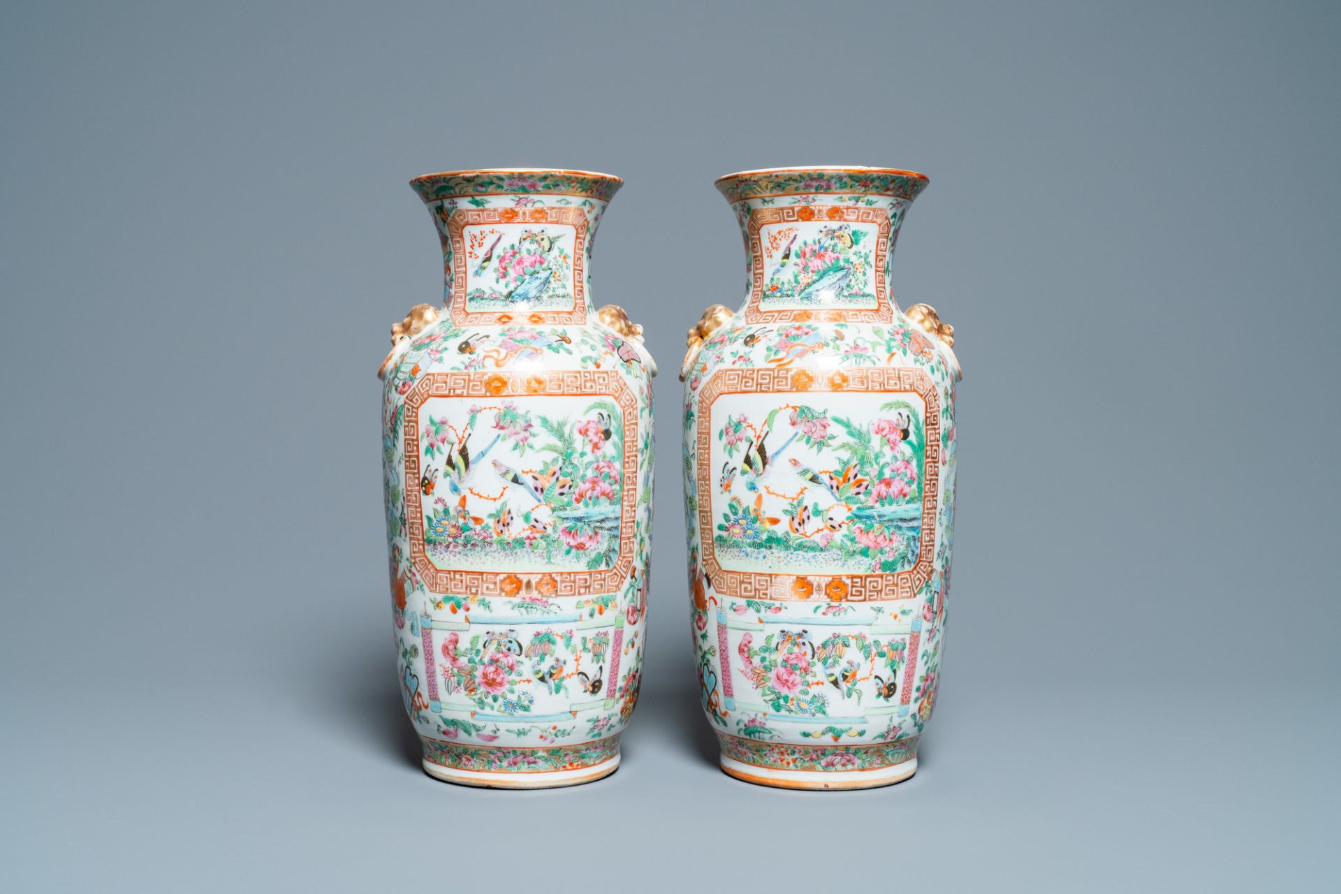 A pair of Chinese Canton famille rose vases, 19th C.