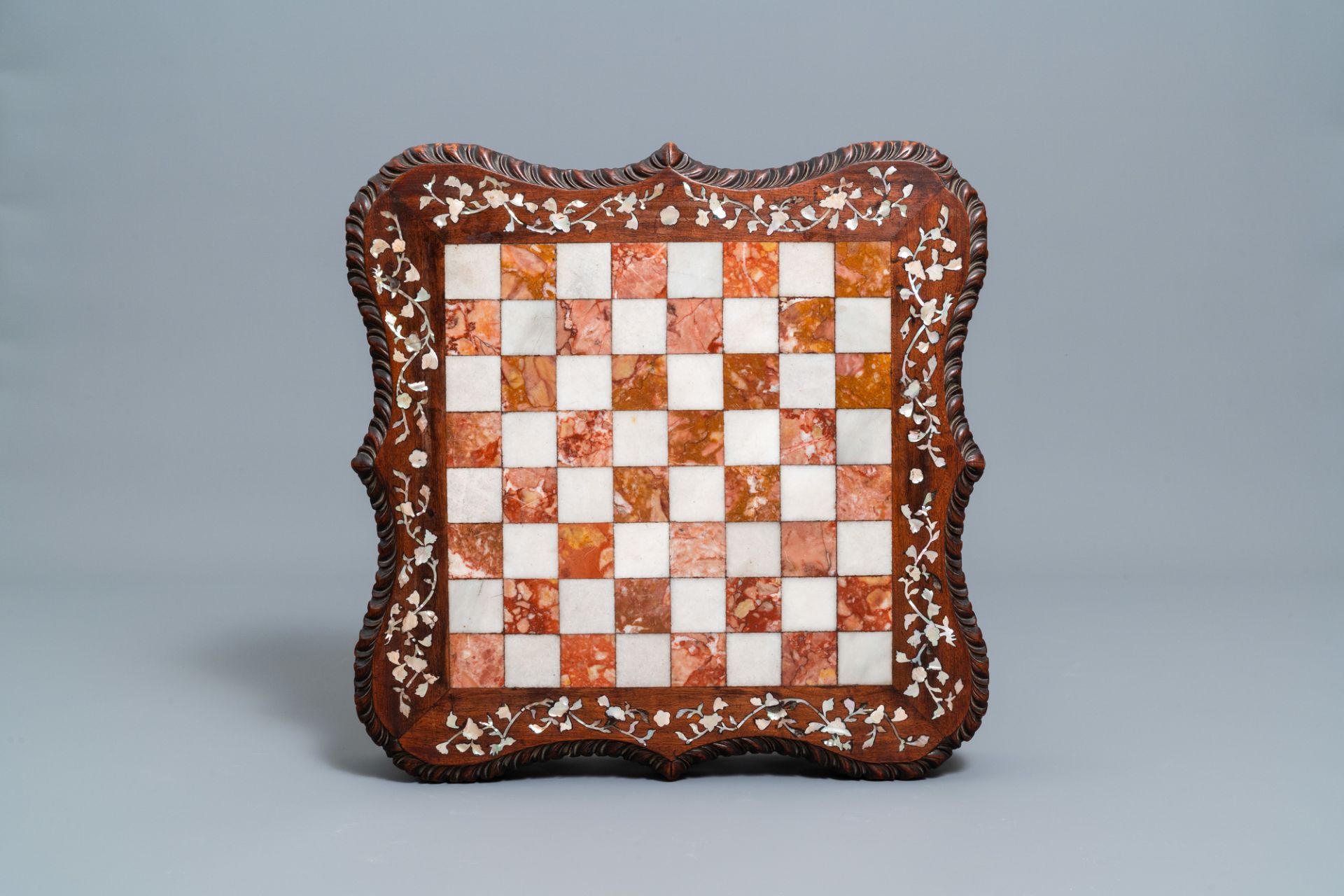 A Chinese carved wooden side table with marble chessboard top, 19th C. - Image 16 of 17