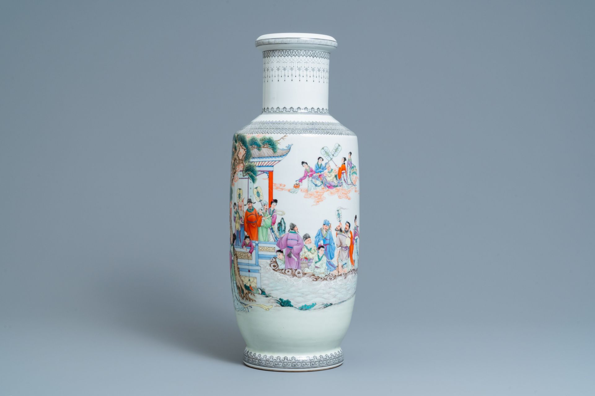 A Chinese famille rose rouleau vase with figures in a garden, Republic