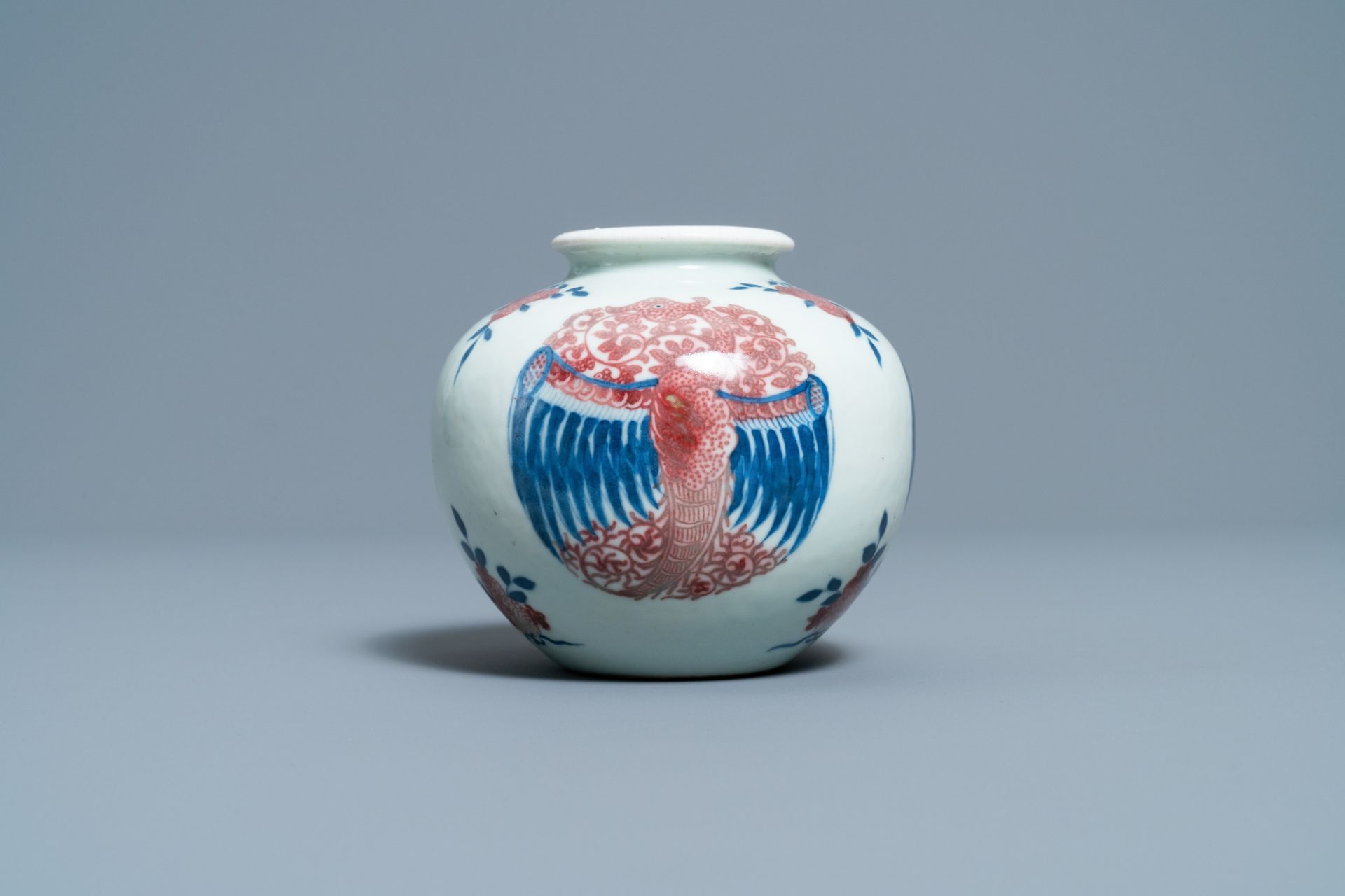 A Chinese blue, white and copper-red 'phoenixes' water pot, Kangxi mark, 19th C. - Image 2 of 7