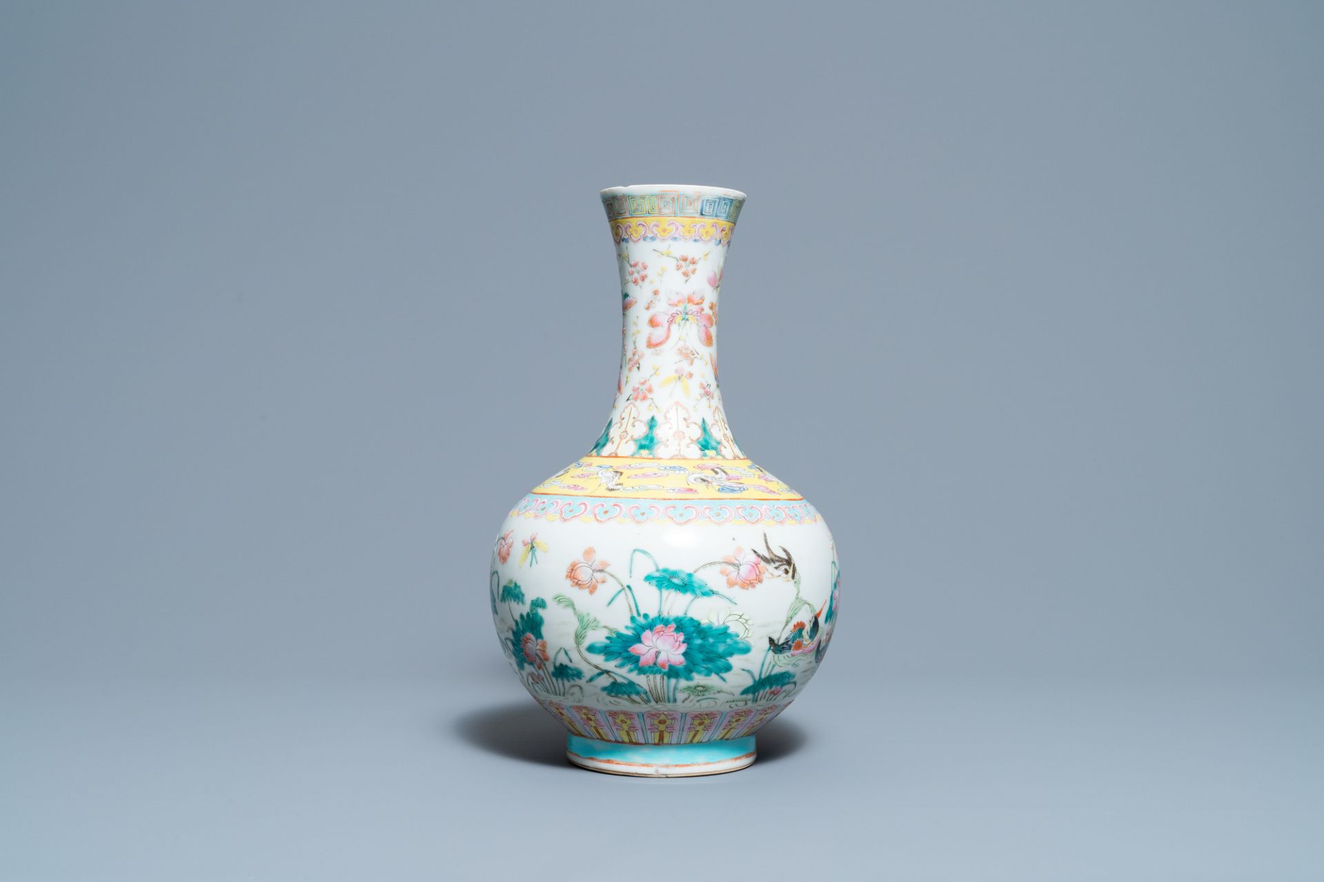 A Chinese famille rose bottle vase with mandarin ducks in a lotus pond, 19th C. - Image 3 of 6