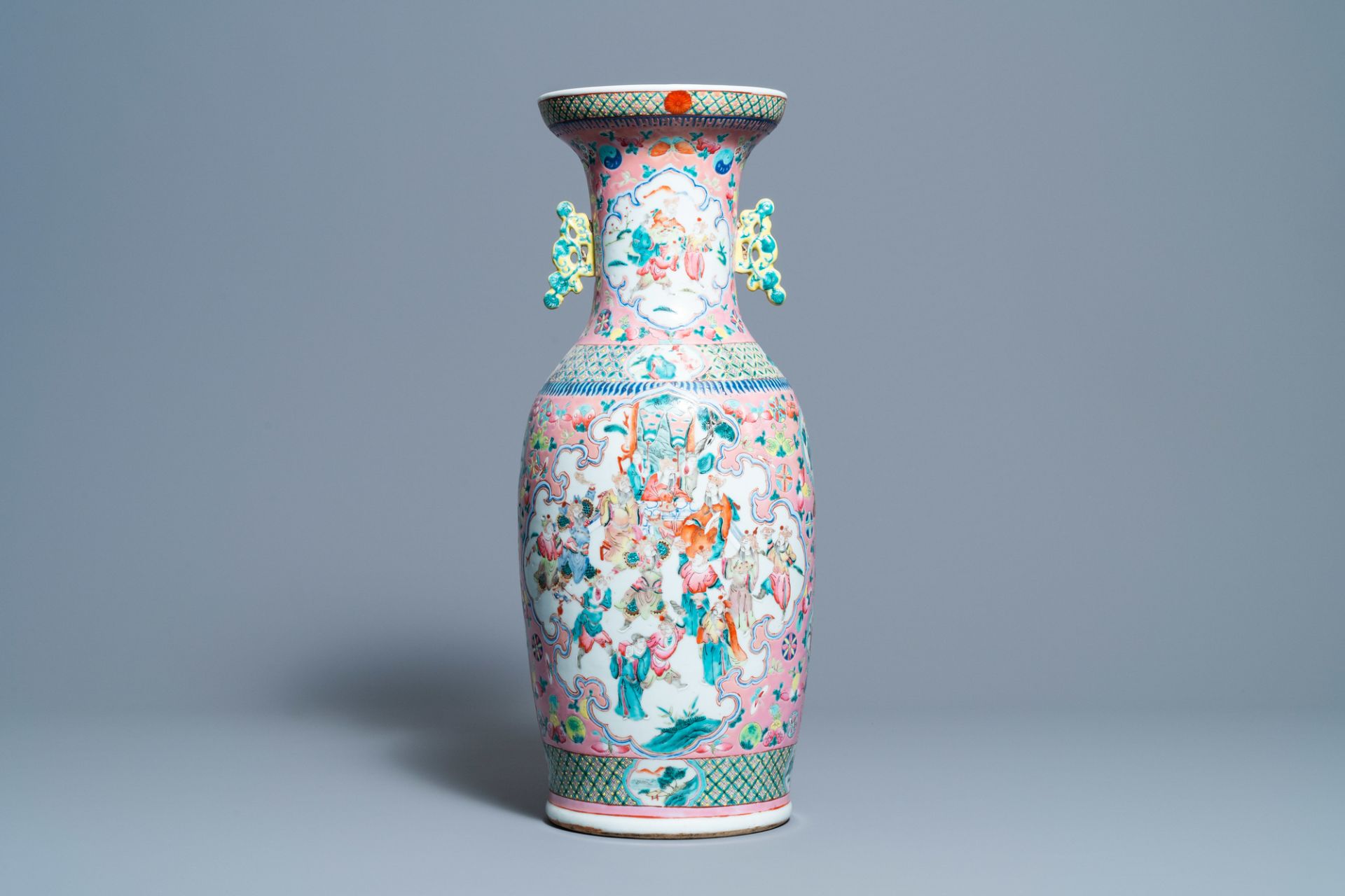 A Chinese pink-ground famille rose vase, 19th C.