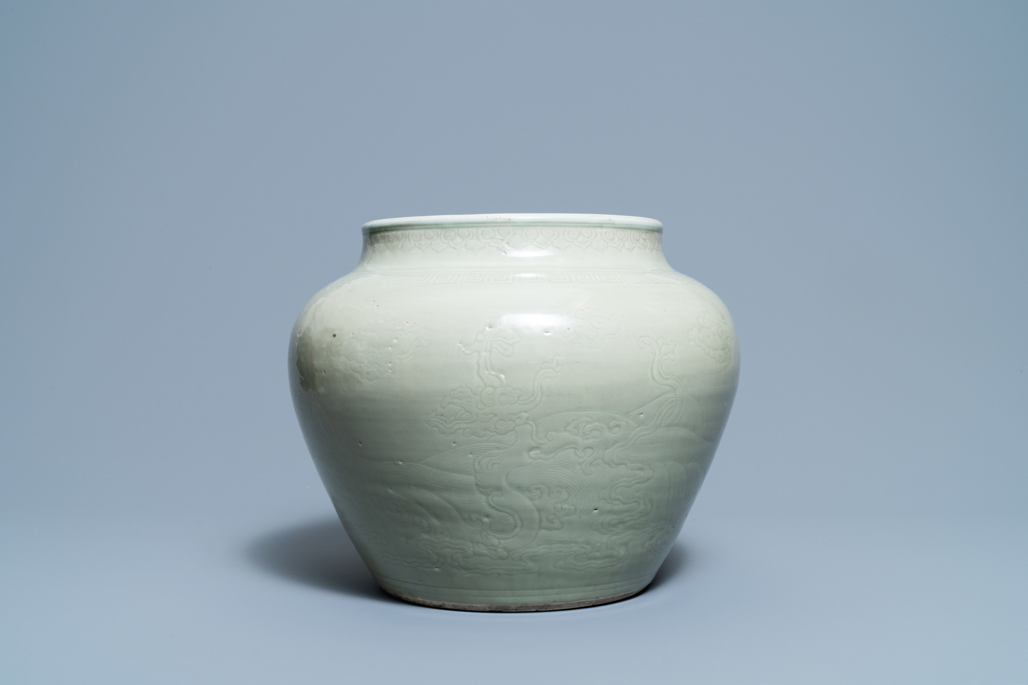 A globular Chinese monochrome celadon 'dragon' vase, Kangxi - Image 5 of 8