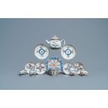 A Chinese famille verte teapot, seven saucers and five cups, Kangxi