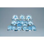 Sixteen Chinese blue and white saucers and fourteen cups, Kangxi