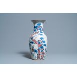 A Chinese blue, white and copper-red 'deer and crane' vase, 19th C.