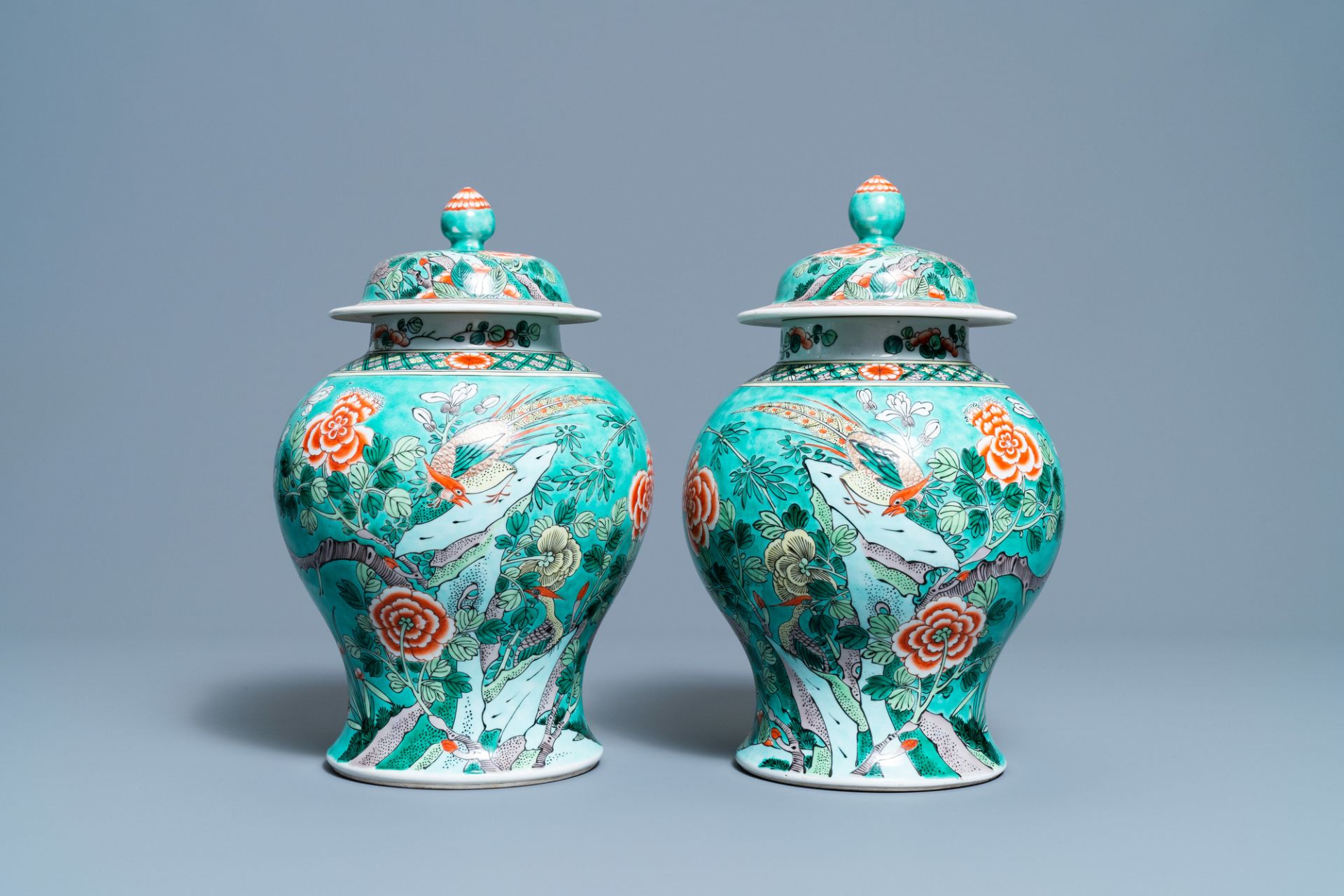 A pair of Chinese turquoise-ground famille verte vases and covers, 19th C. - Image 2 of 7