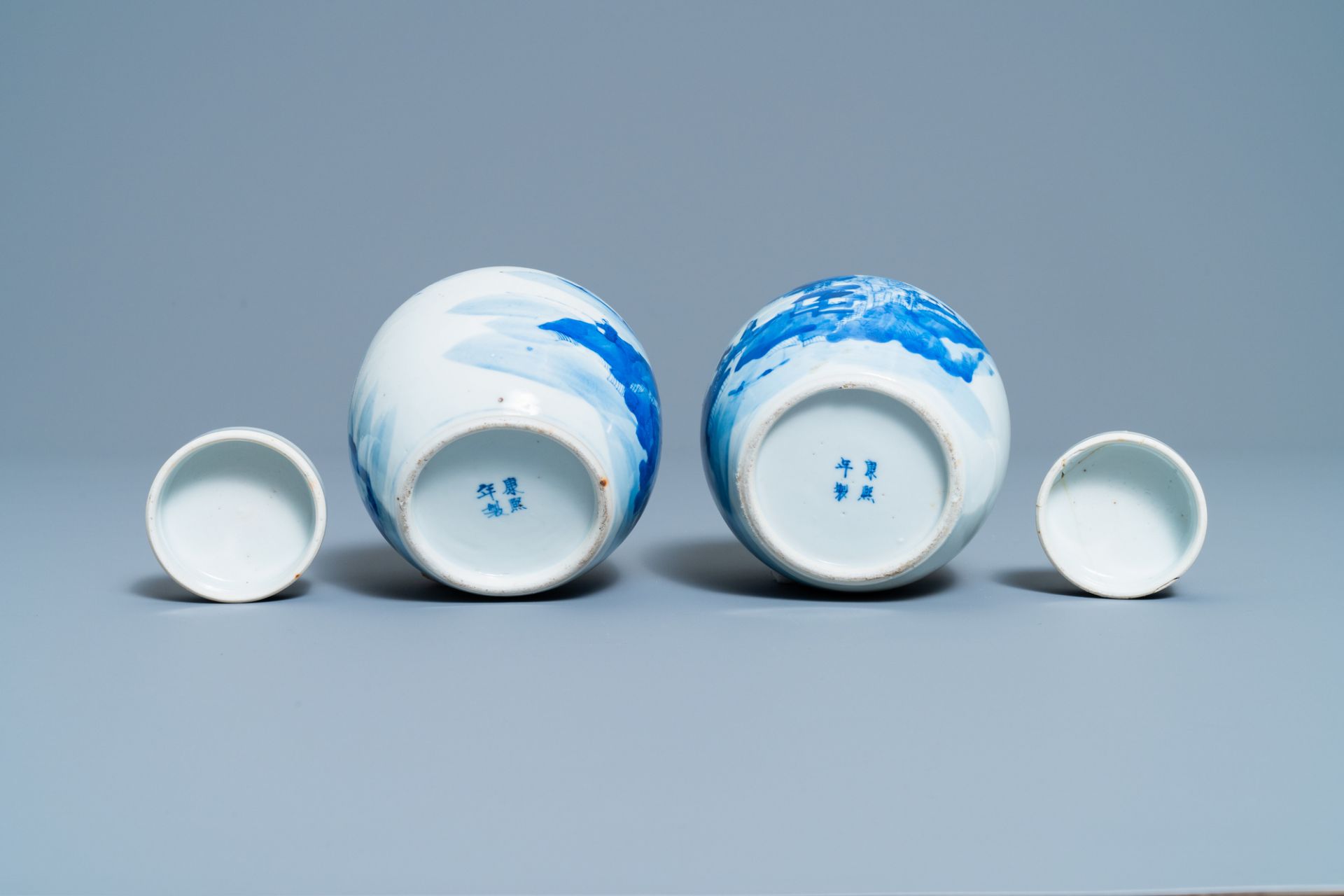 A pair of Chinese blue and white covered jars and a pair of famille rose vases, 19th C. - Image 13 of 13