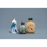 Three Chinese chalcedony, cloisonne and porcelain snuff bottles, 19th C.