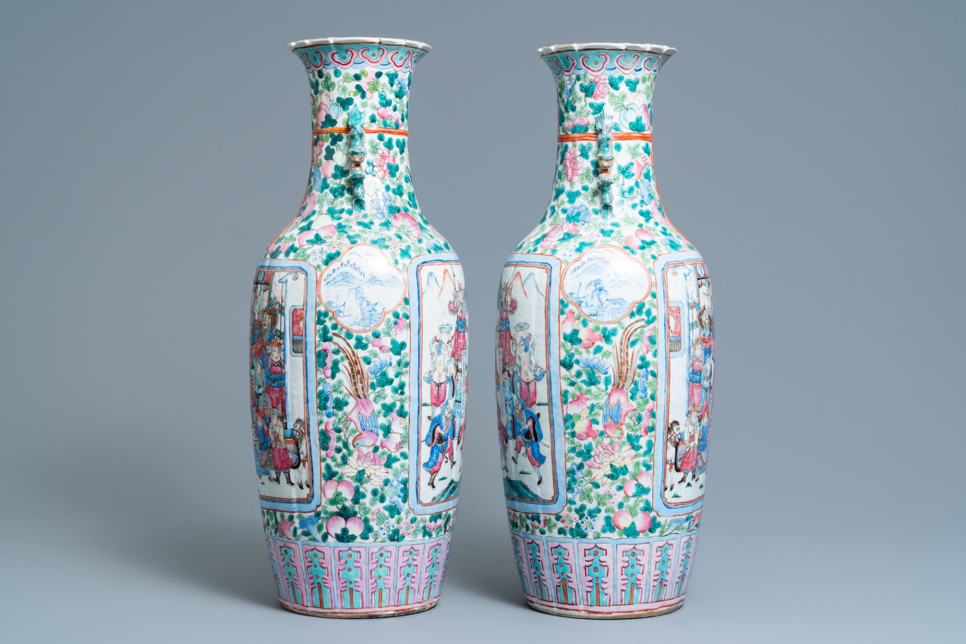 A pair of Chinese famille rose vases with court and warrior scenes, 19th C. - Image 2 of 12