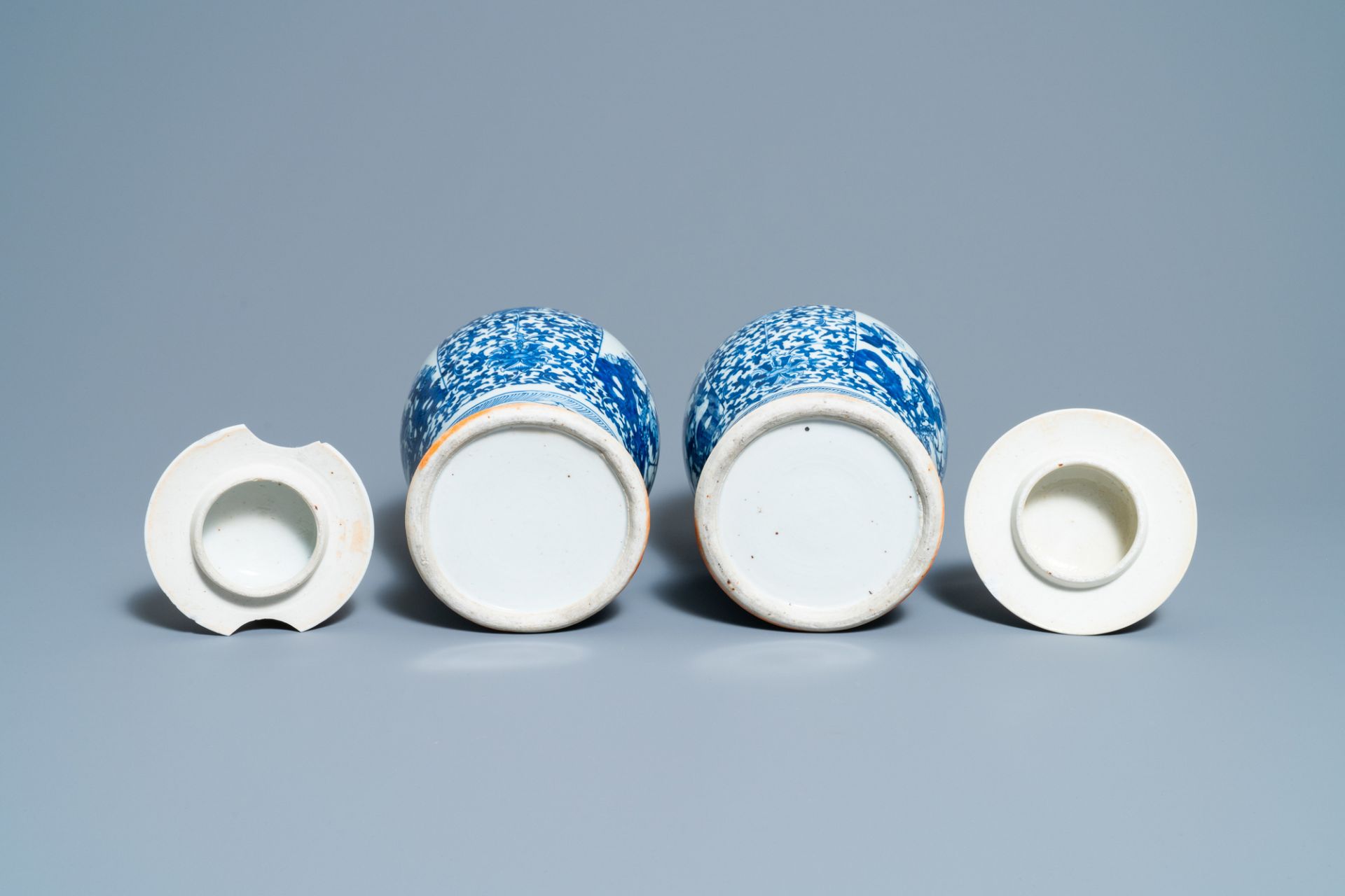 A pair of Chinese blue and white vases and a famille rose jar and cover, 19/20th C. - Image 7 of 9