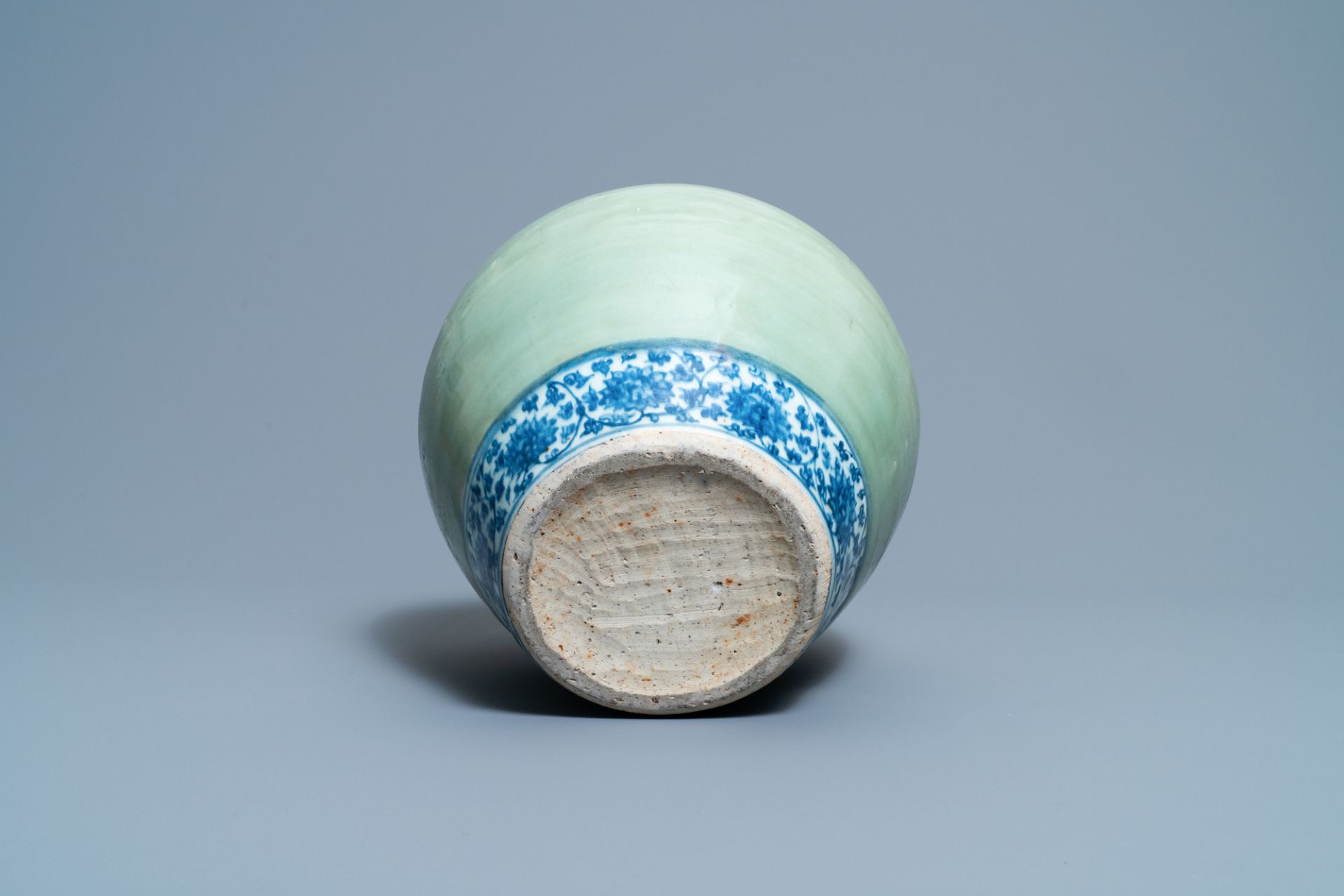 A Chinese celadon-ground and blue and white 'lotus scroll' jar, Ming - Image 7 of 7