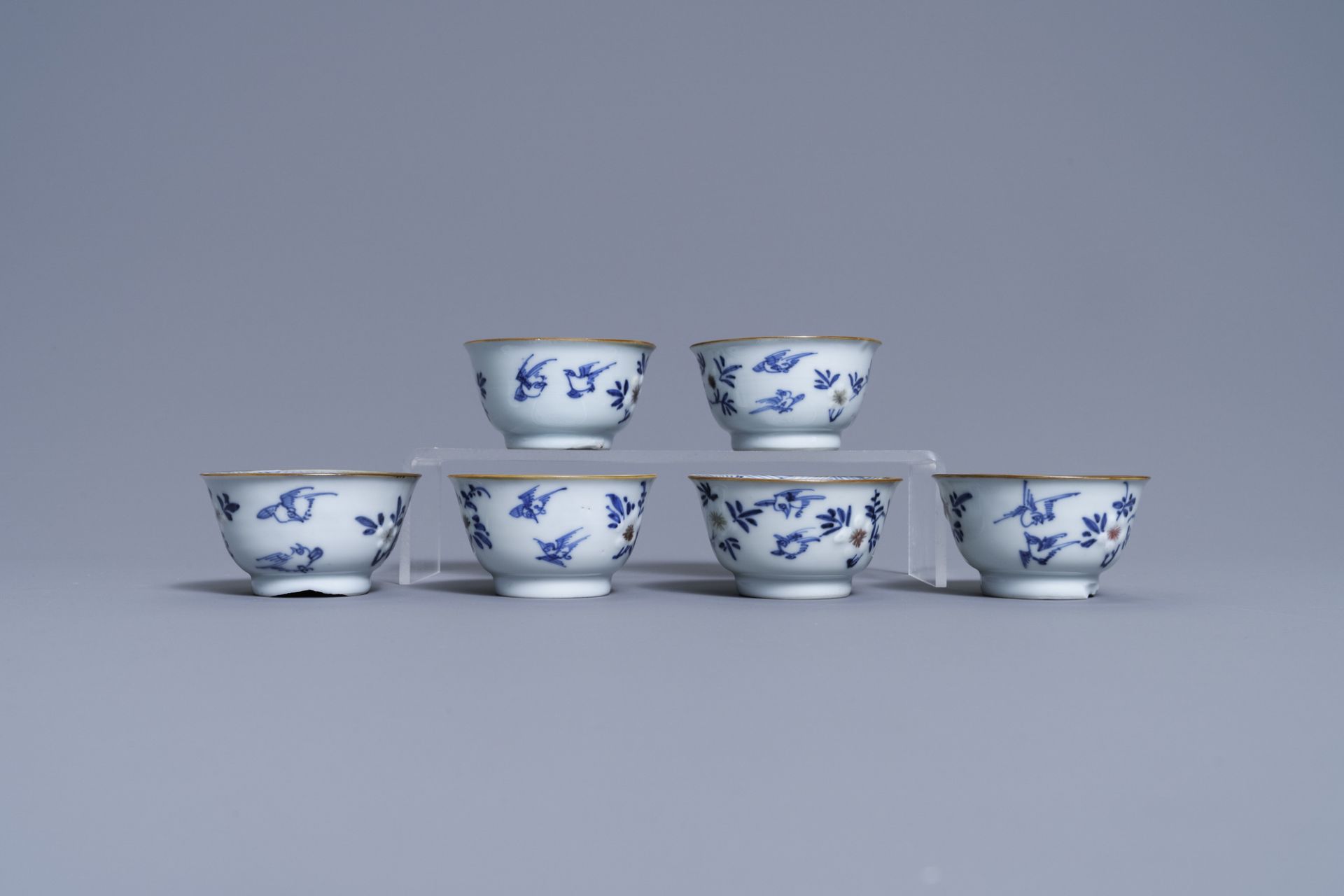 Six Chinese blue, white and copper-red cups and saucers, Kangxi - Image 6 of 9