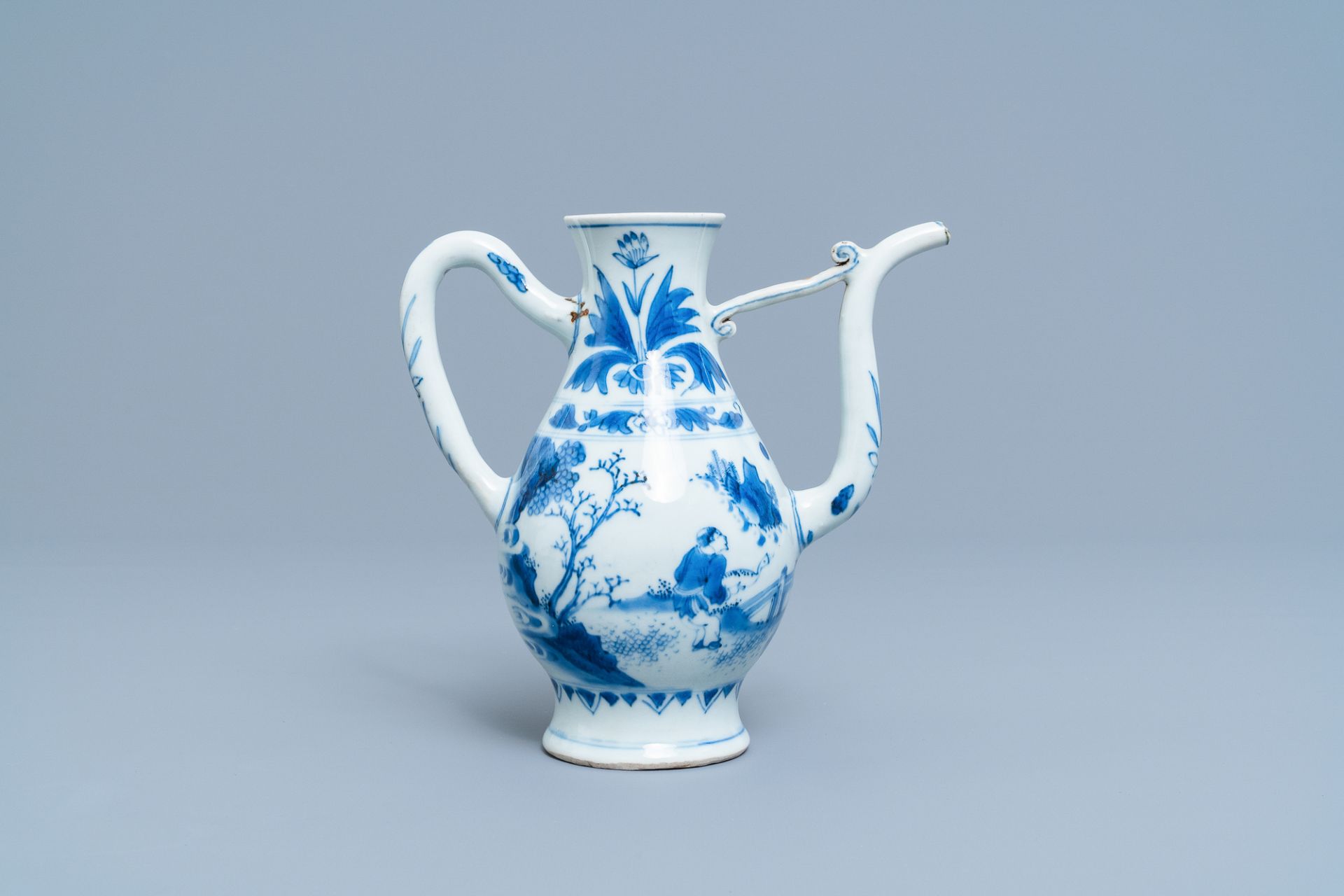 A Chinese blue and white ewer with figures in a landscape, Transitional period - Image 4 of 10