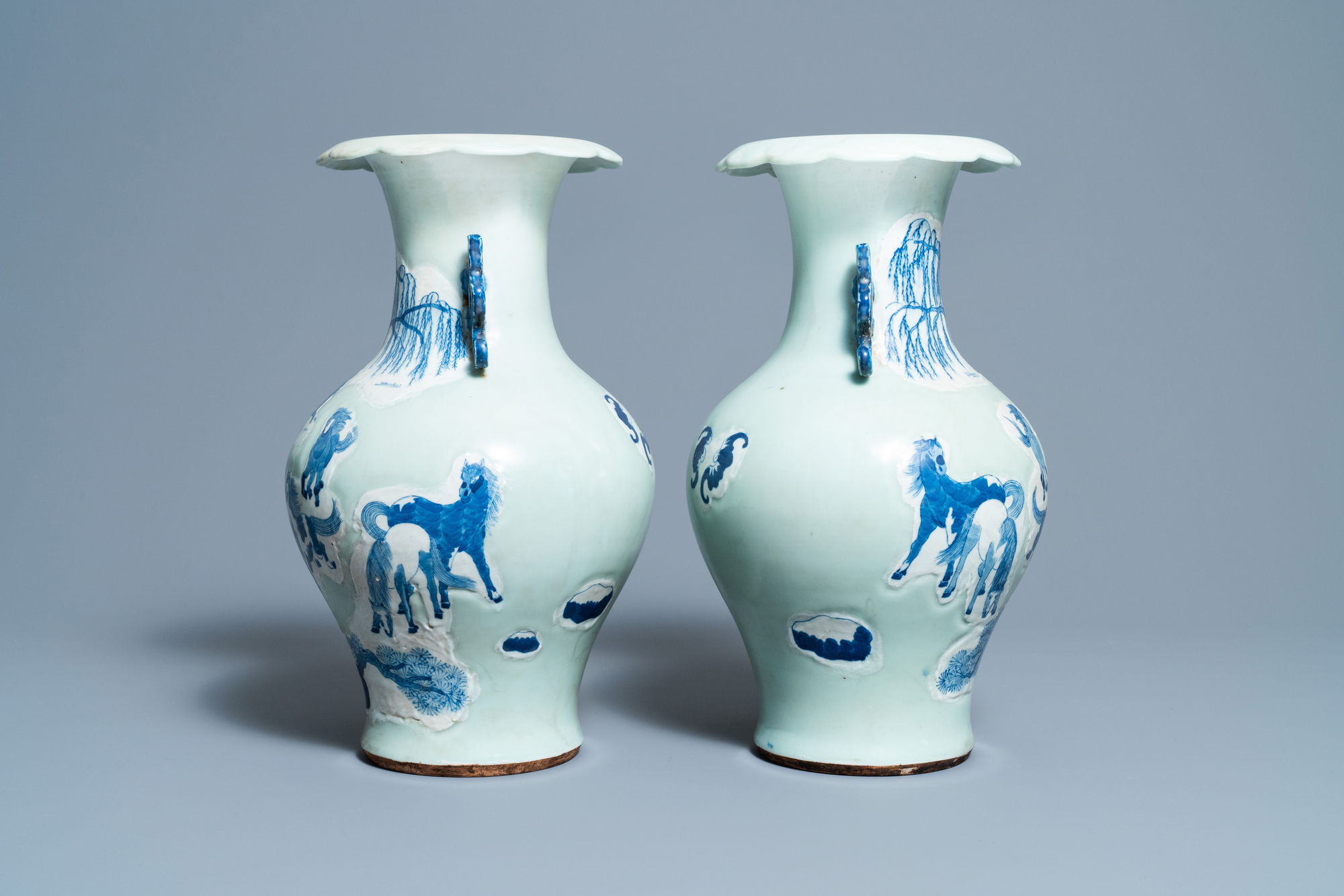 A pair of Chinese blue and white celadon 'horse' vases, 19th C. - Image 2 of 6