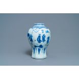 A Chinese blue and white vase with figures in a landscape, Transitional period