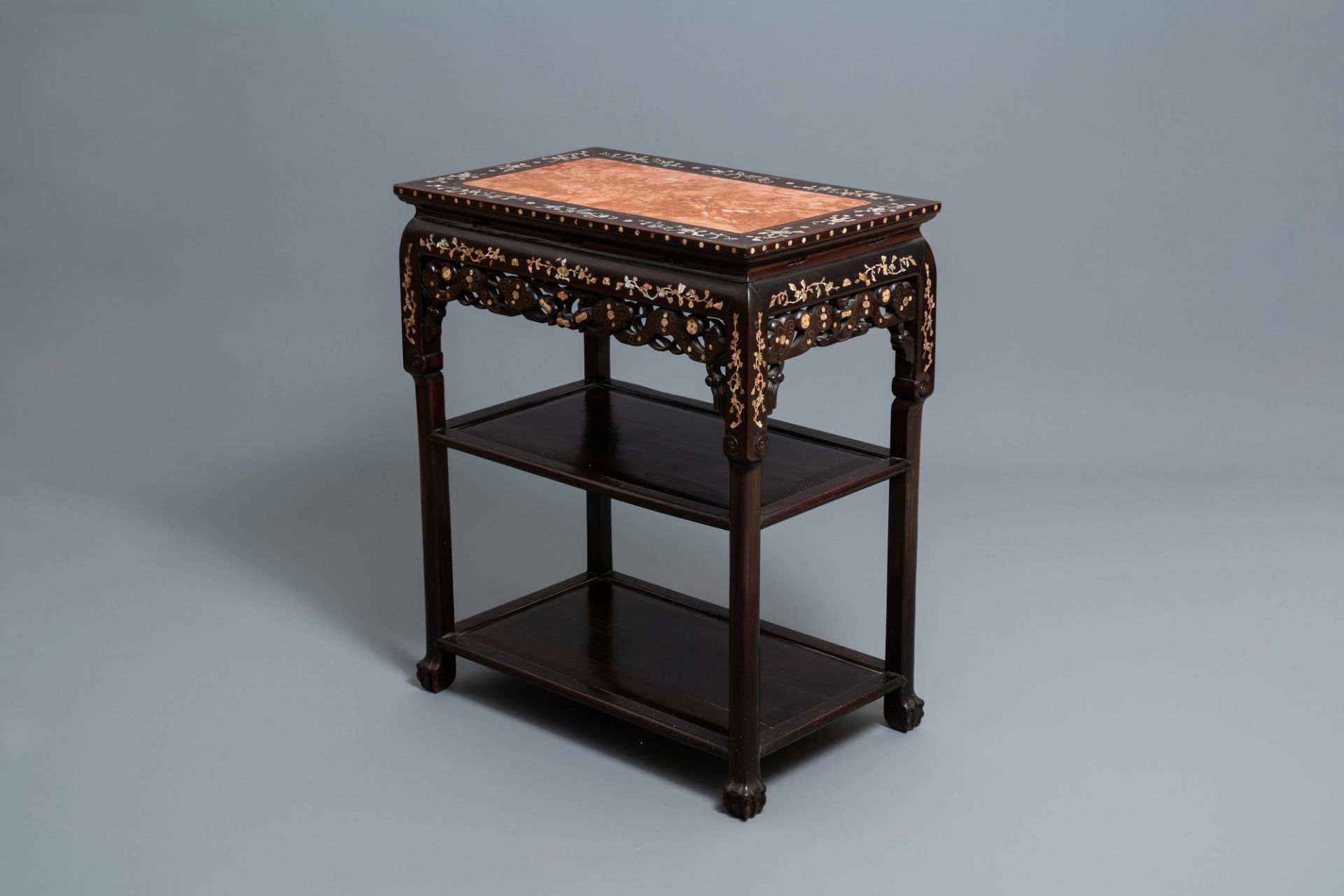 A Chinese mother-of-pearl-inlaid wooden sideboard with marble top, 19th C.