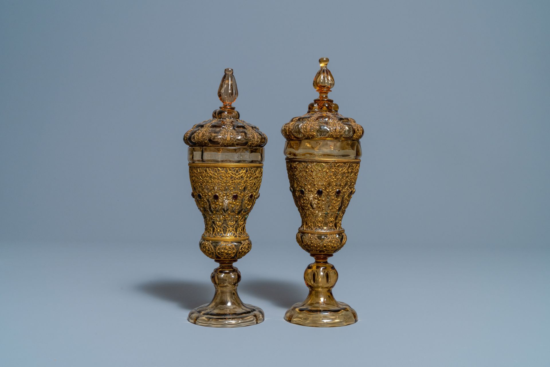 A pair of Russian or Eastern-European gilt copper and glass-inlaid glass goblets and covers, 19th C. - Image 2 of 6