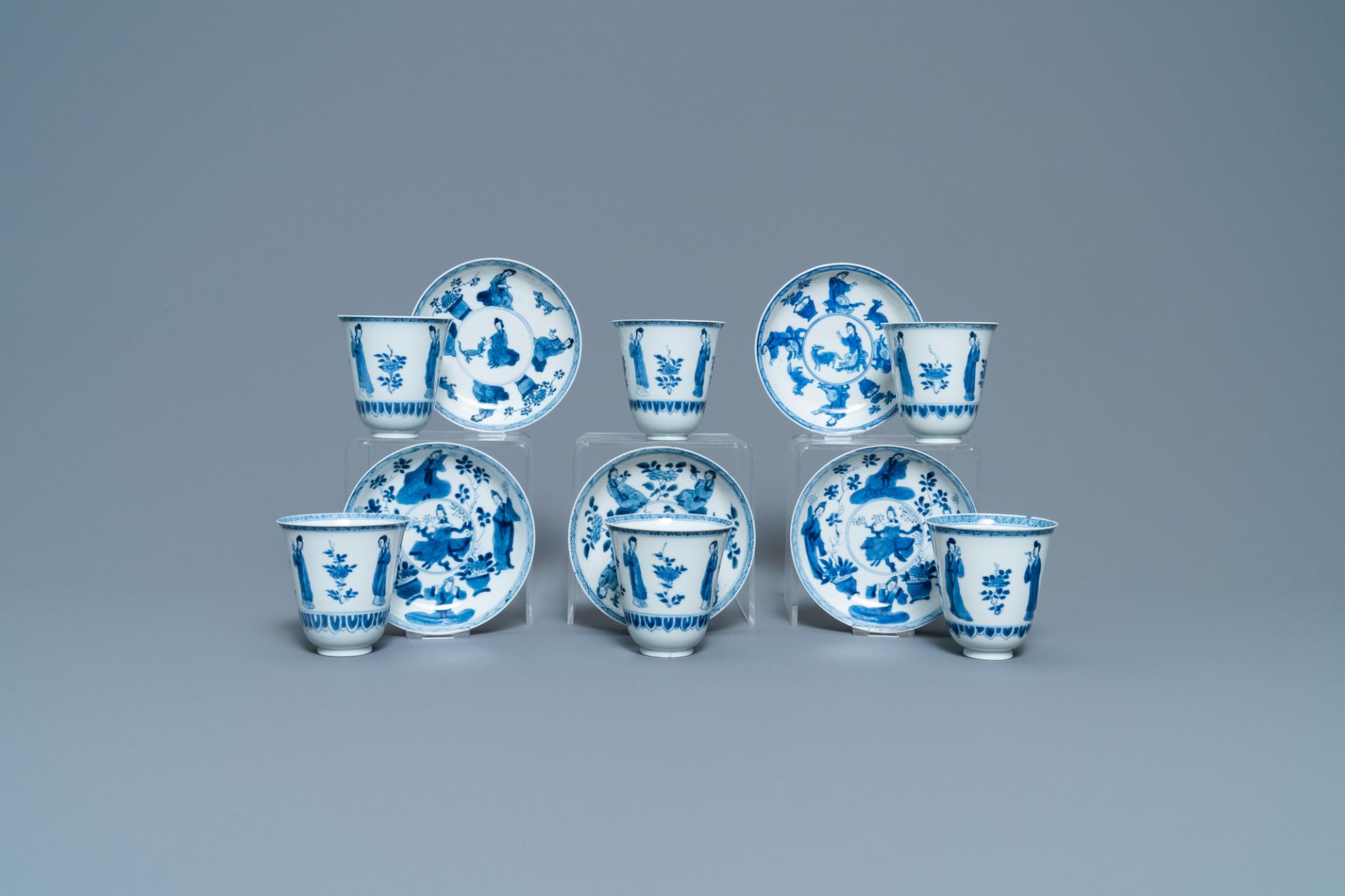 Six large Chinese blue and white cups and five saucers, Yu mark, Kangxi