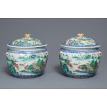 A pair of Chinese famille rose bowls and covers with landscapes, Qianlong mark, Republic