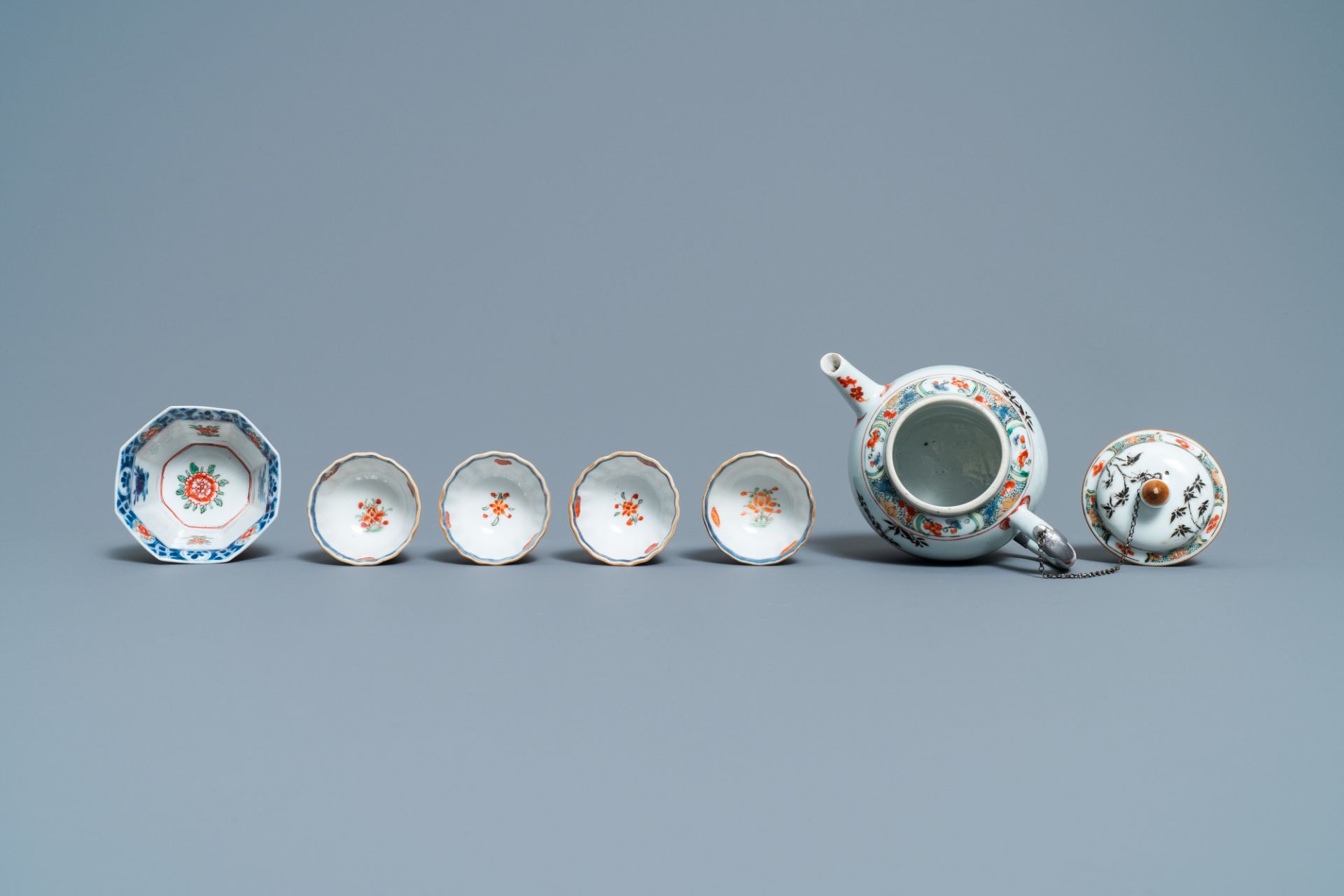 A Chinese famille verte teapot, seven saucers and five cups, Kangxi - Image 8 of 9