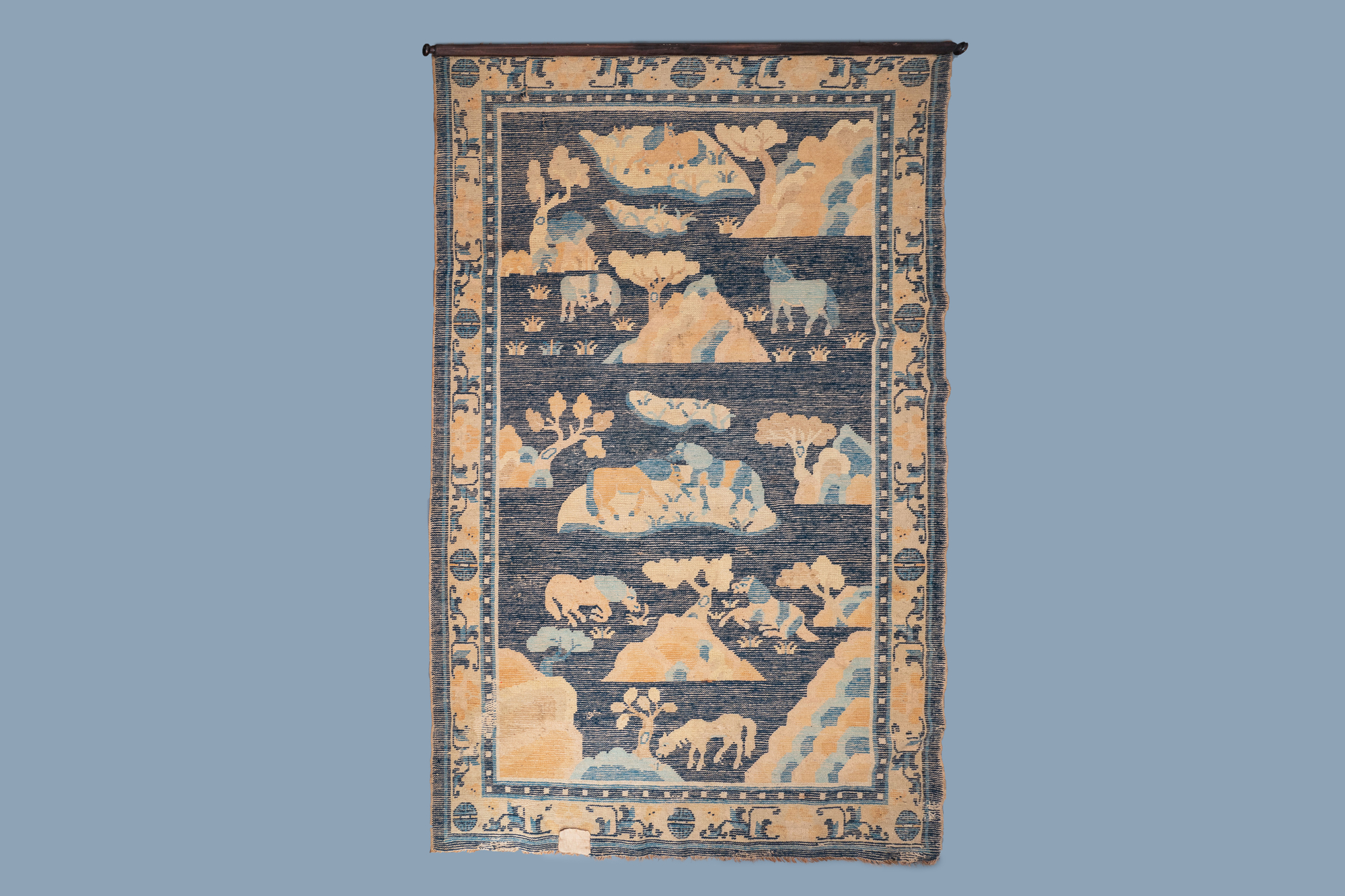 A large Chinese rectangular 'Eight horses of Mu Wang' carpet, 19th C. - Image 2 of 5