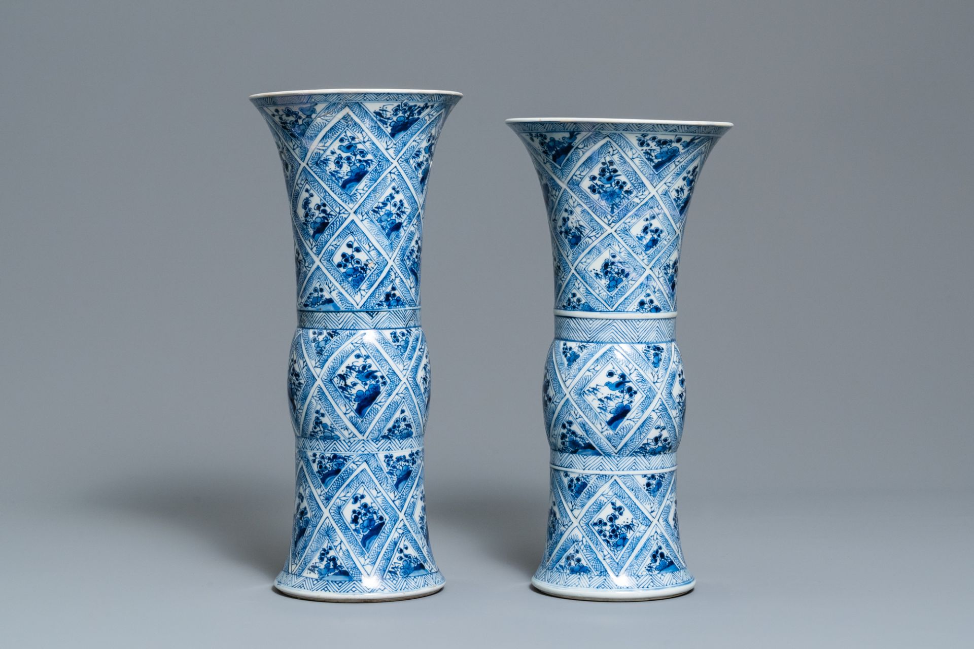 A large Chinese blue and white five-piece garniture with floral and landscape panels, Kangxi - Image 12 of 66