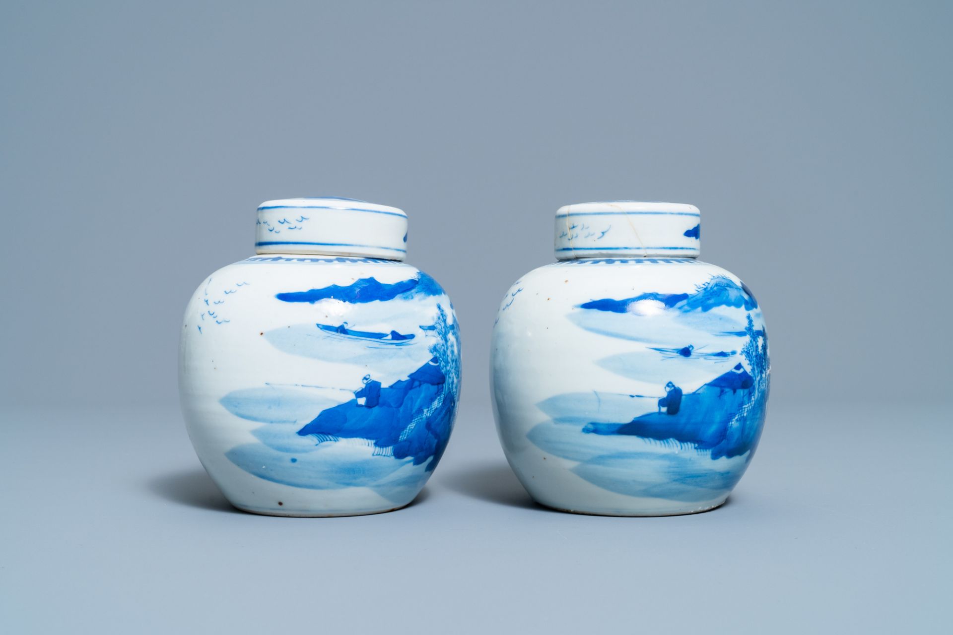 A pair of Chinese blue and white covered jars and a pair of famille rose vases, 19th C. - Image 11 of 13
