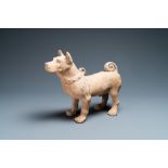 A large Chinese grey pottery model of a dog, Han