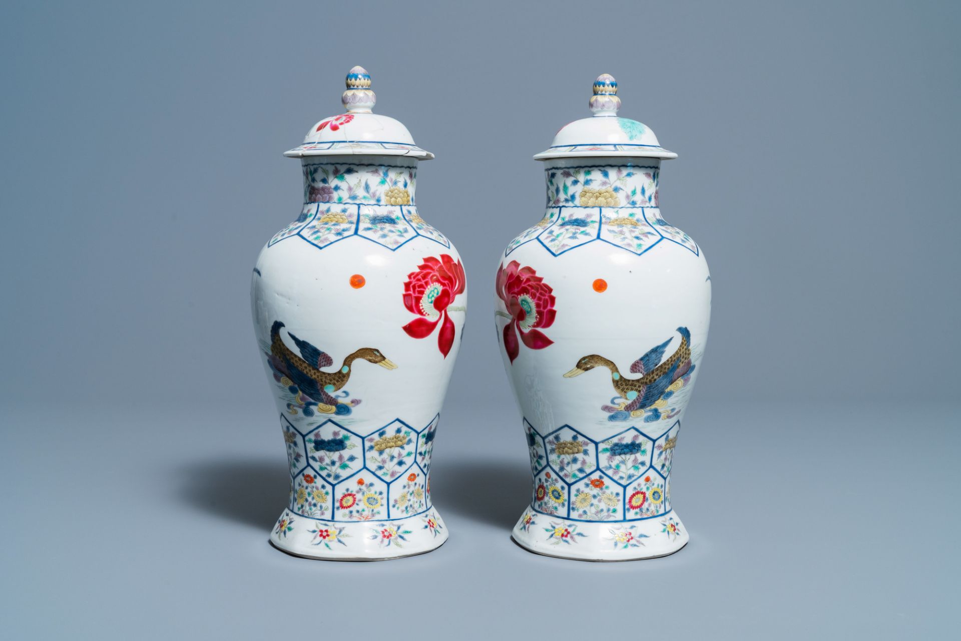 A pair of Chinese famille rose 'mandarin ducks' vases and covers, Kangxi mark, Republic - Image 3 of 6