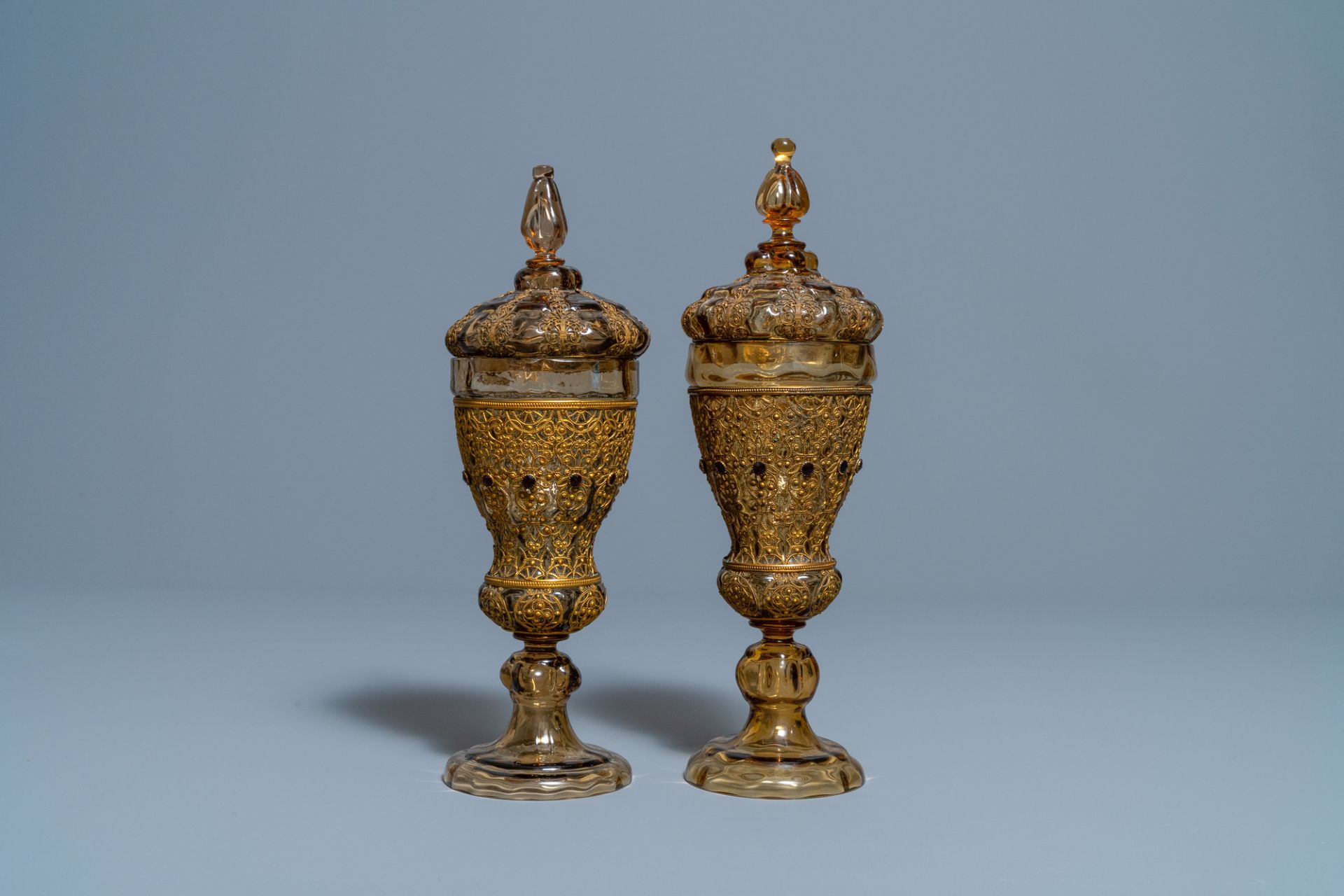 A pair of Russian or Eastern-European gilt copper and glass-inlaid glass goblets and covers, 19th C. - Image 4 of 6