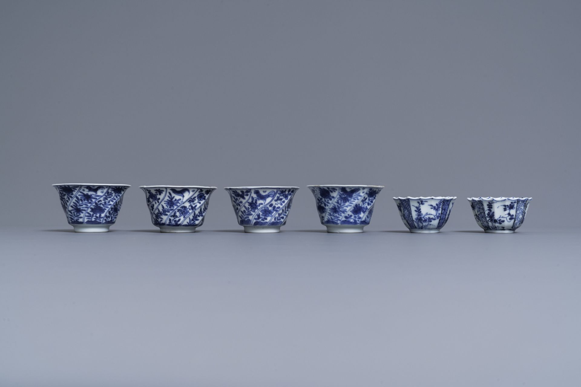 Six Chinese blue and white cups and saucers and eleven miniature vases, Kangxi - Image 12 of 17