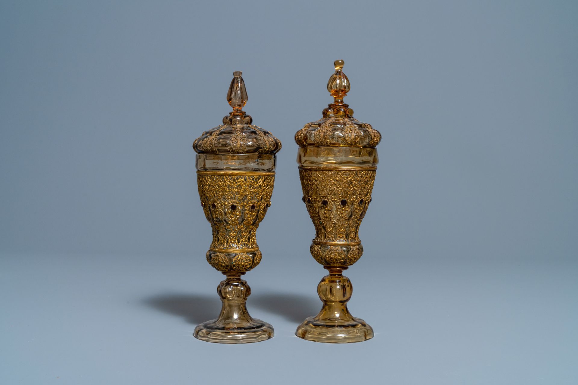 A pair of Russian or Eastern-European gilt copper and glass-inlaid glass goblets and covers, 19th C. - Image 3 of 6